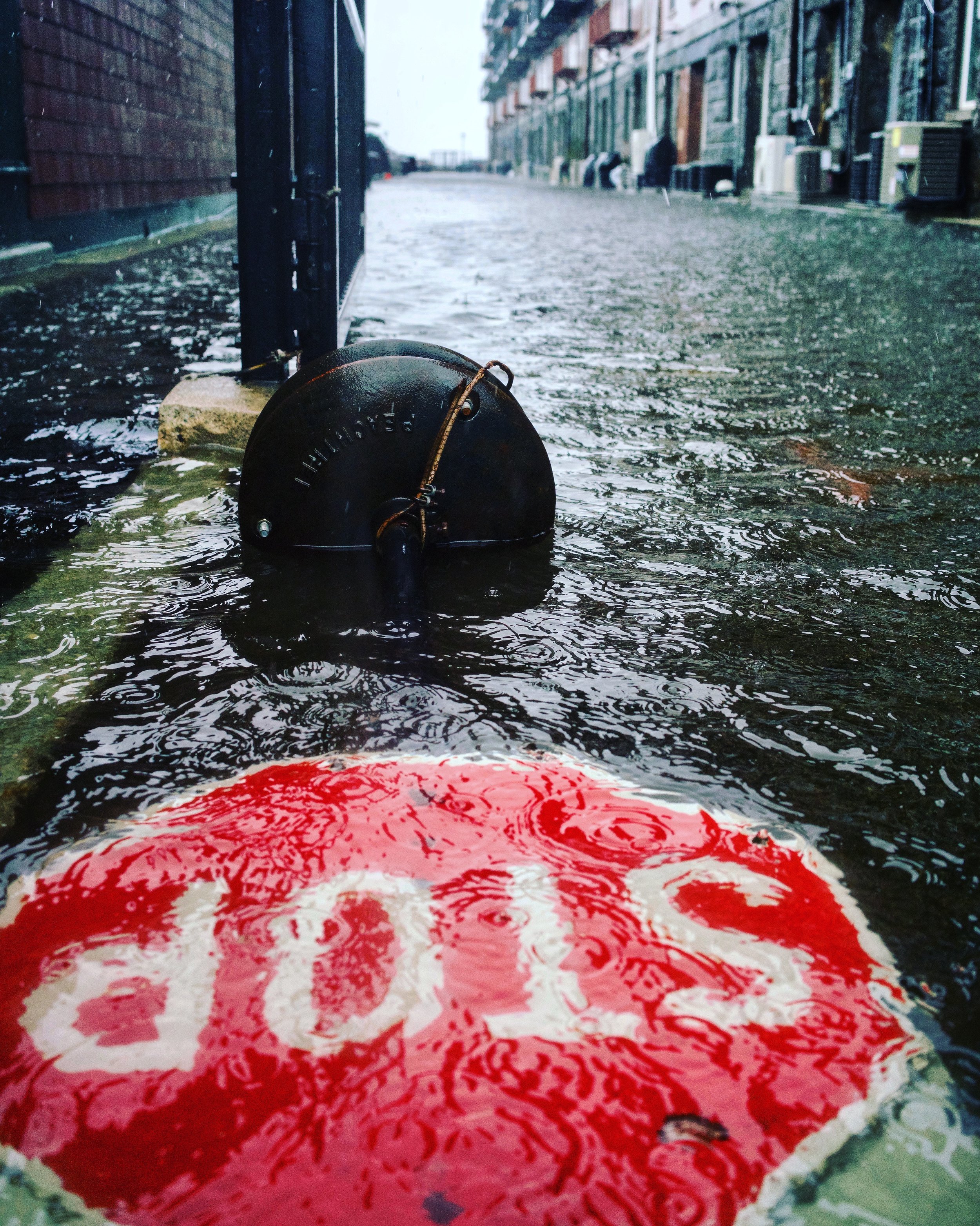 The storm surge of a Nor'easter floods Lewis Wharf in Boston