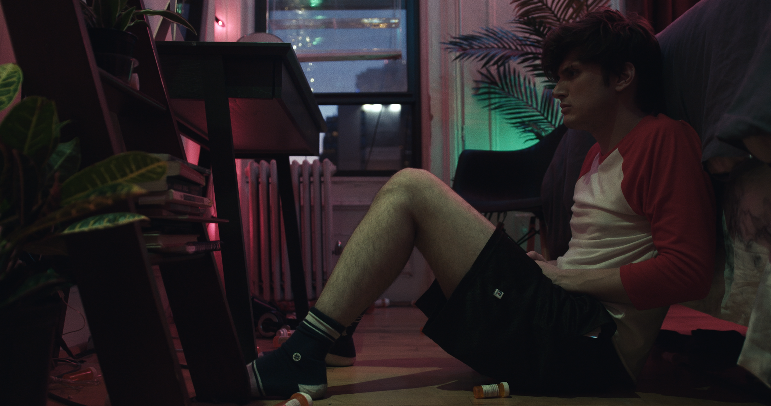 julian on floor in room_altspacefilm.png