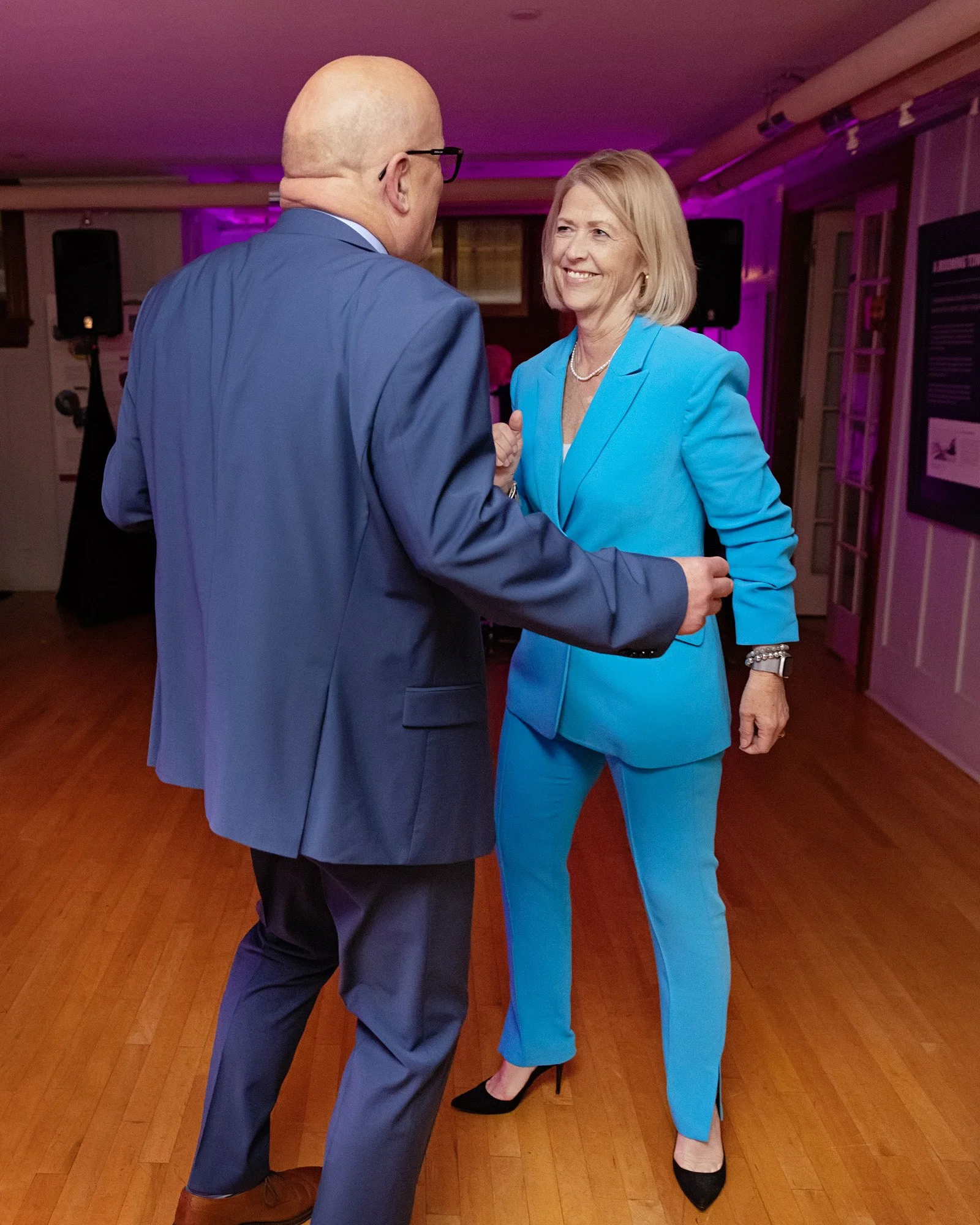 couple dancing during live band performance
