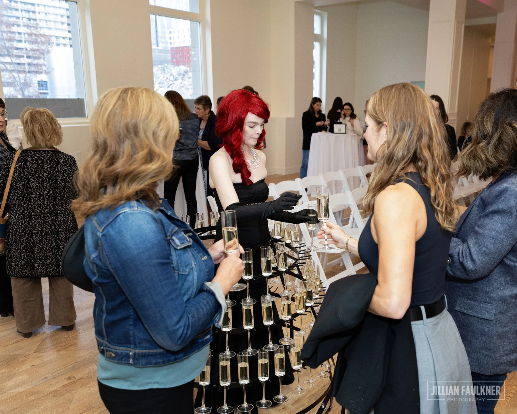 Calgary event photography capturing guests enjoying champagne reception