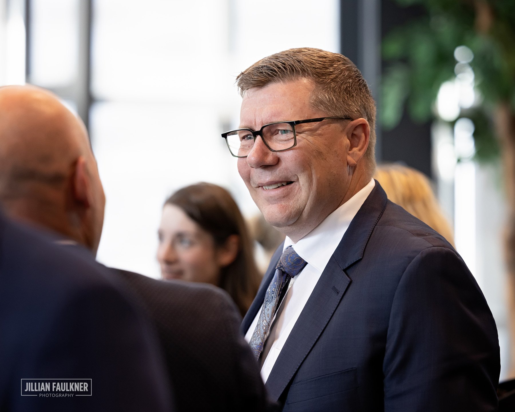 Professional political event photography Calgary Premier Moe speaking at Enserva Drive to Double summit 2025