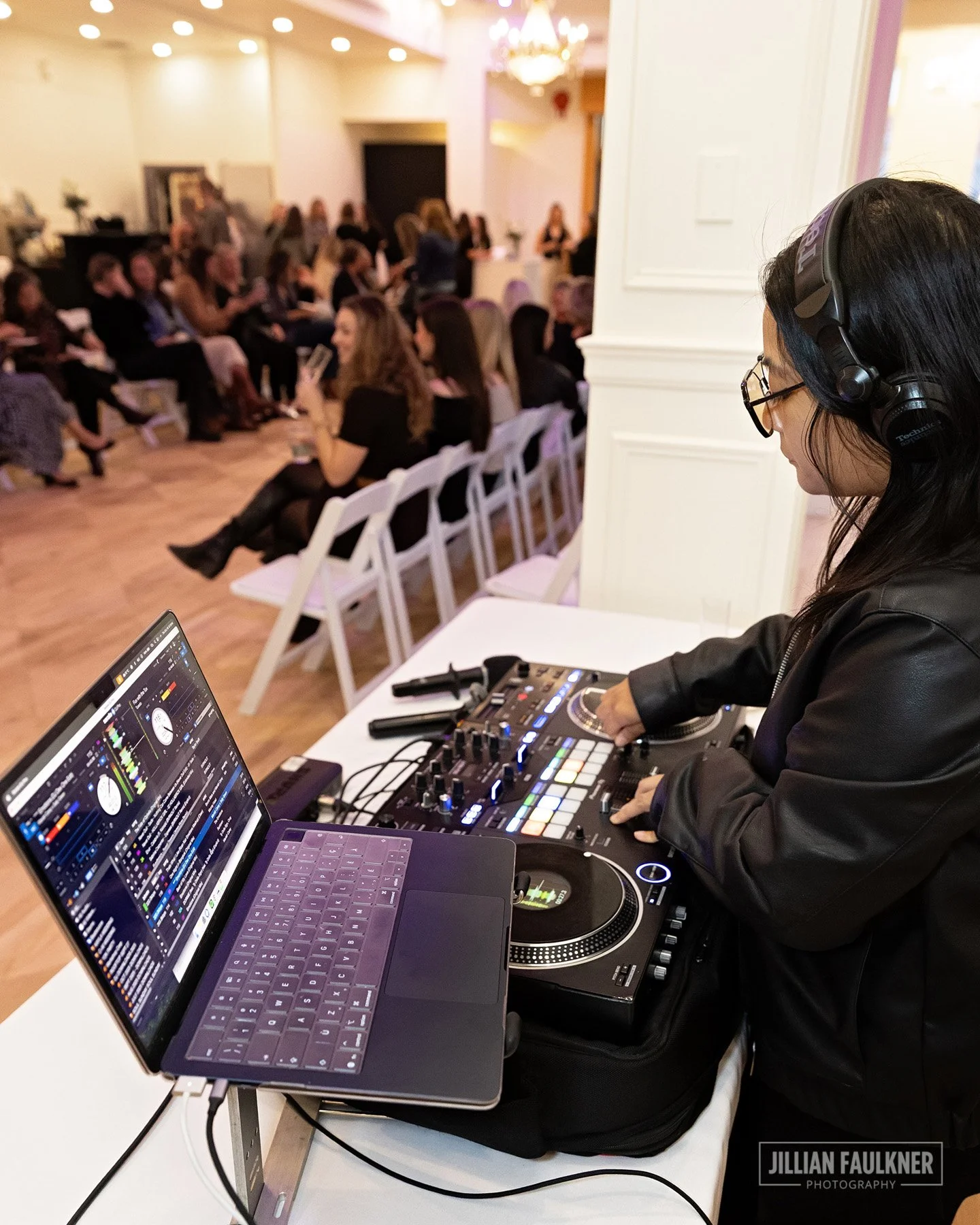 Calgary fashion show photographer documenting live DJ at runway show