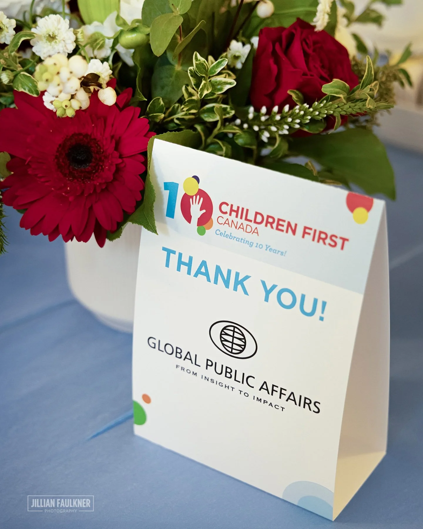 sponsor recognition photographed beside table centrepiece