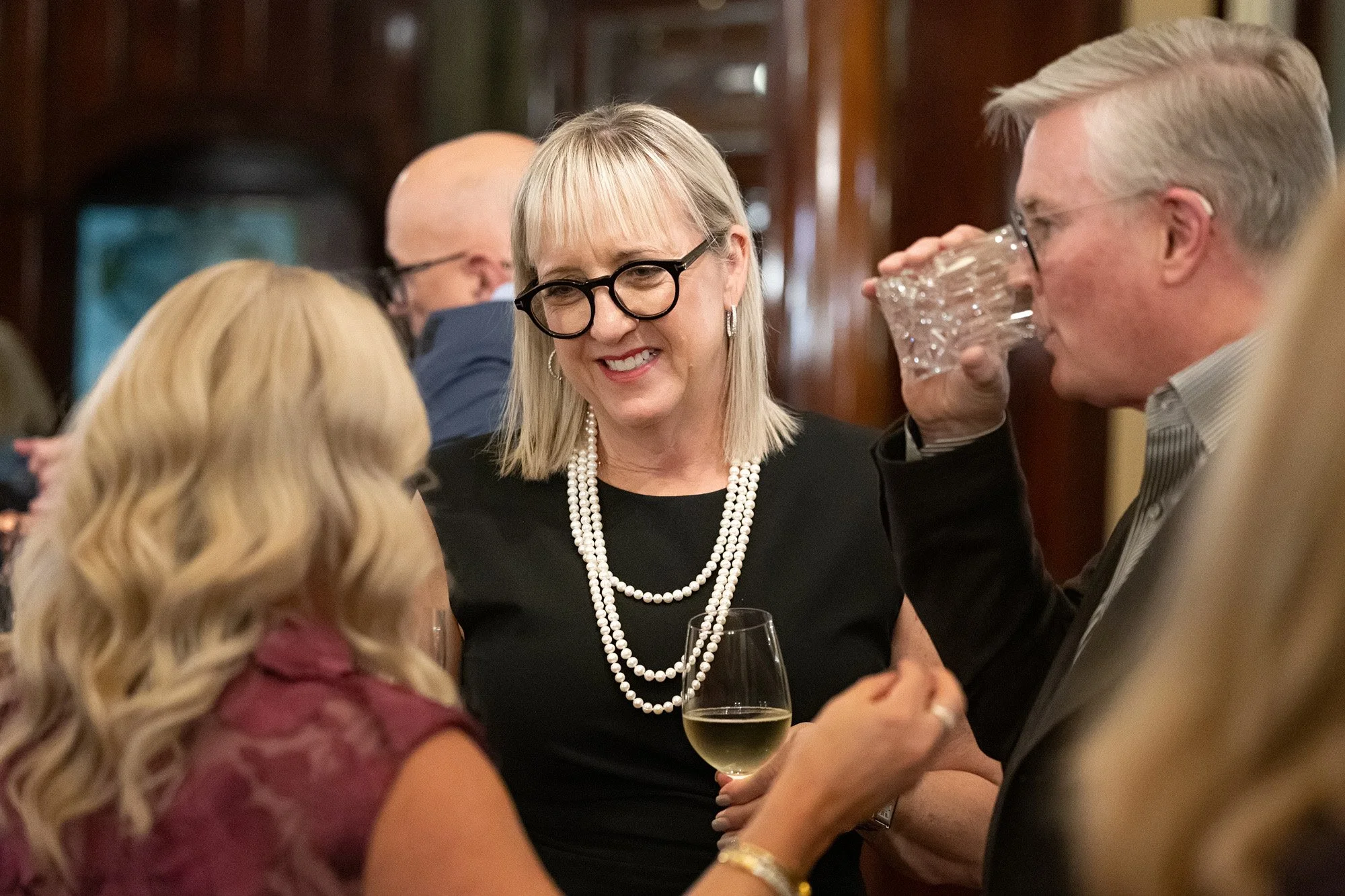 Professional candid event photography at intimate Calgary private anniversary celebration