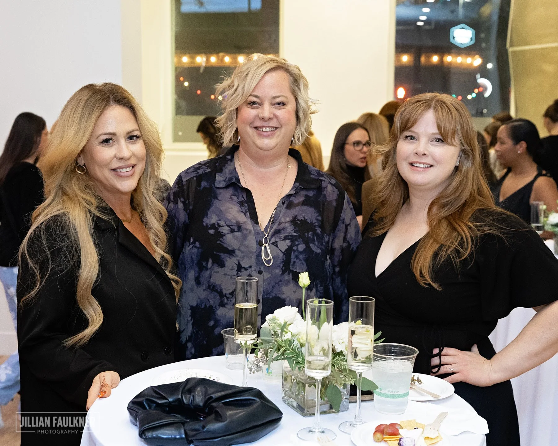 Calgary Alberta professional event photographer captures energy and excitement of guests arriving at Brookline PR's exclusive Fall Fashion Show