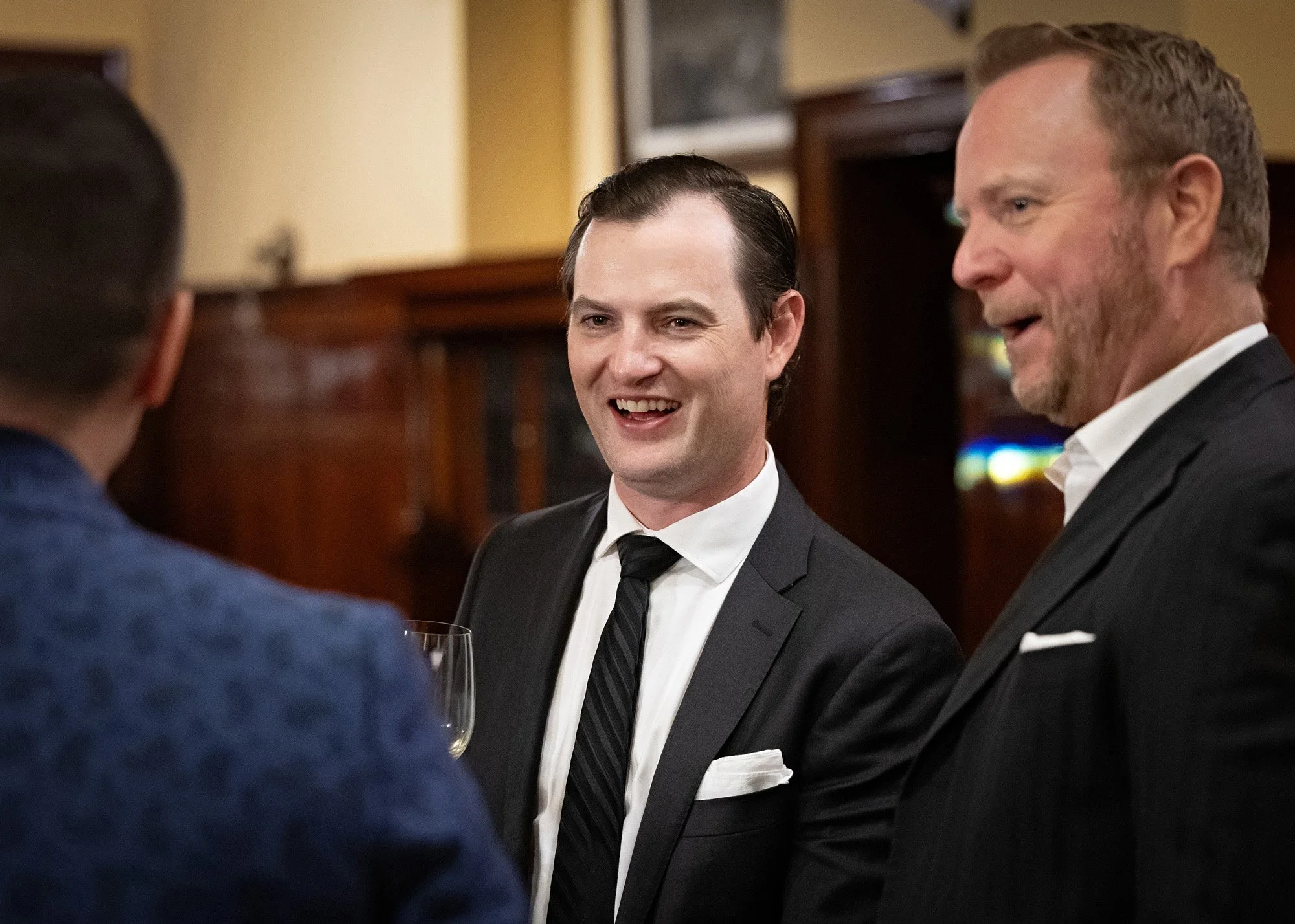 Unscripted moment beautifully captured by professional Calgary event photographer at Lougheed House