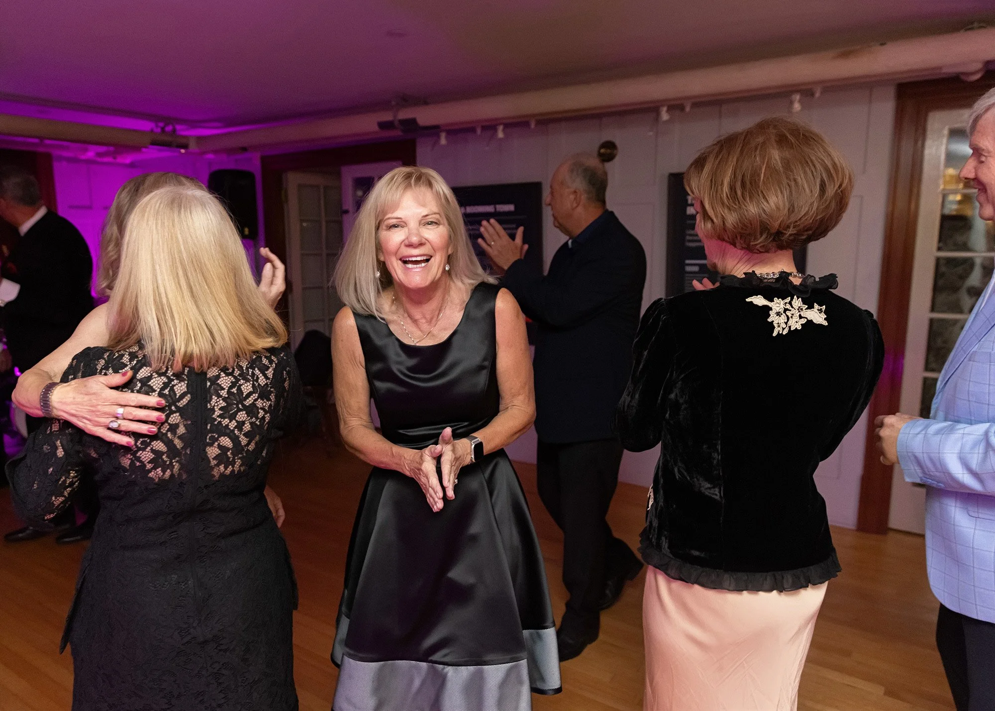 Guests dancing at intimate event during live band performance
