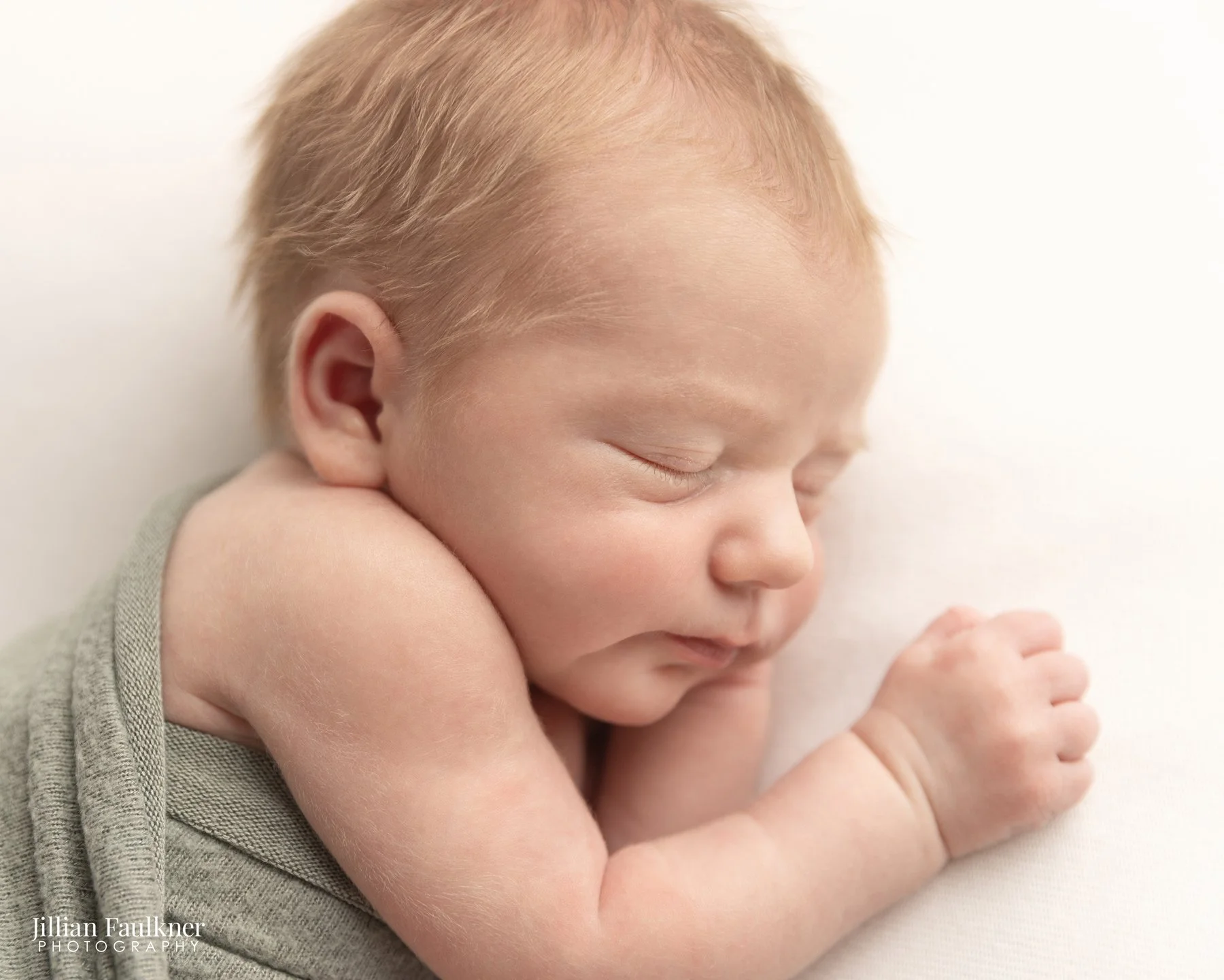 newborn baby boy close up portrait photographed at Calgary newborn photography studio