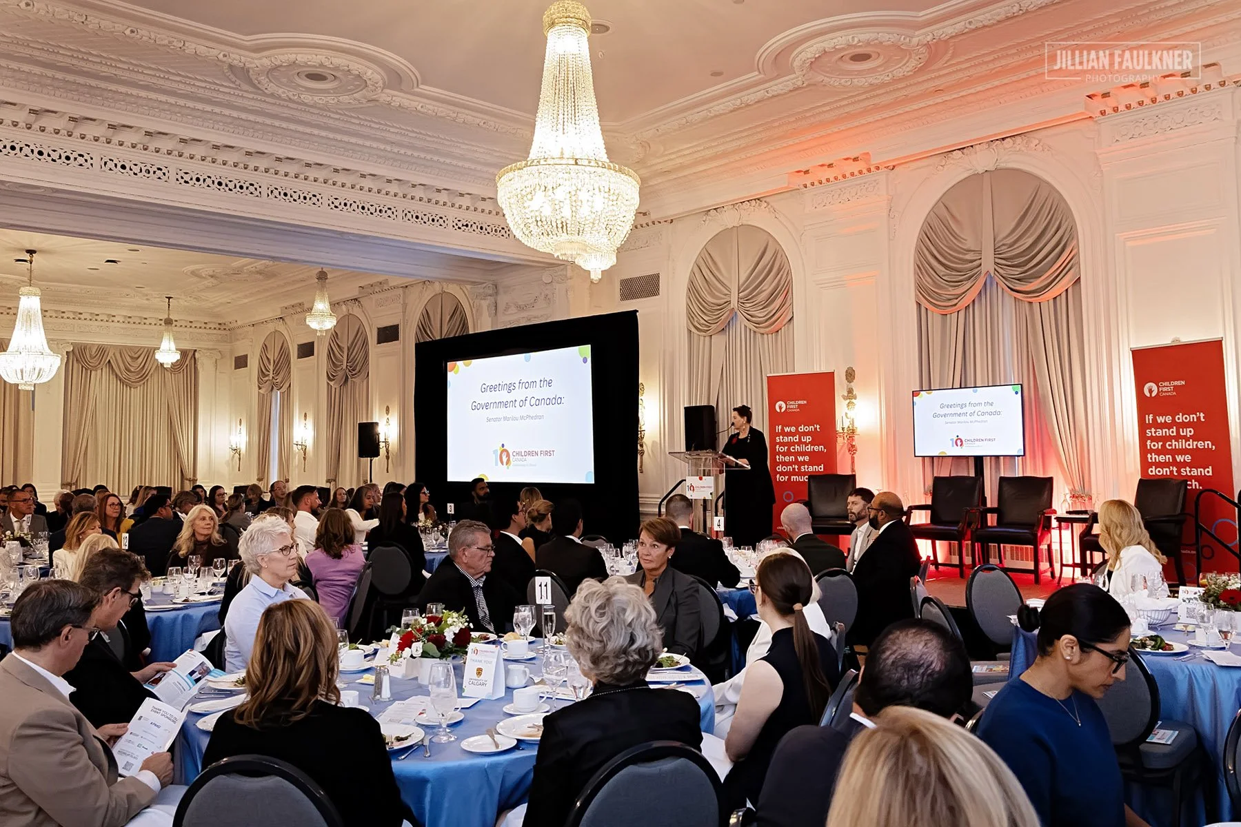 Calgary special event photographer documenting award ceremony highlights at corporate luncheon