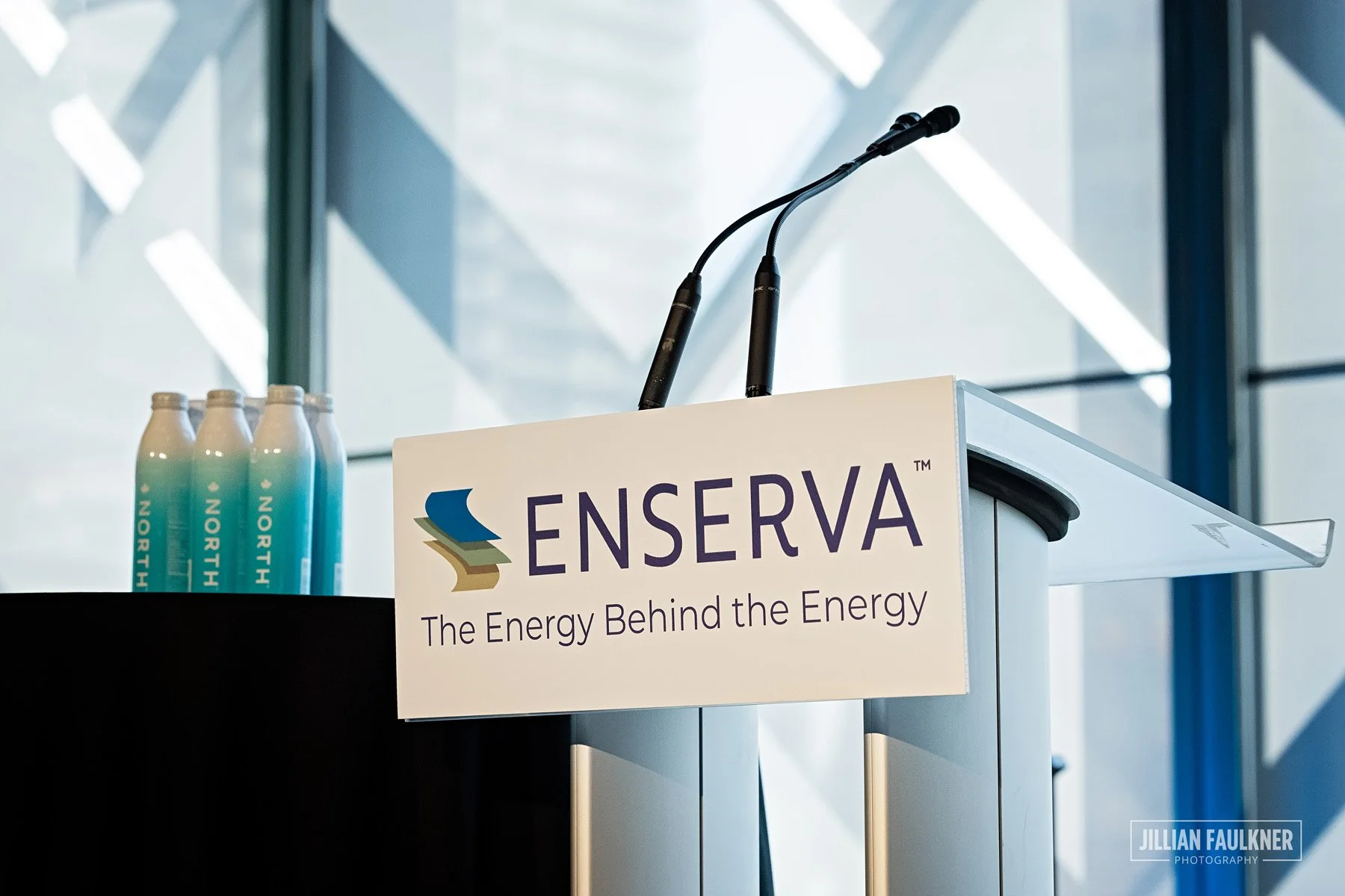 Professional Calgary event photographer captures Enserva branding and event details at Drive to Double summit