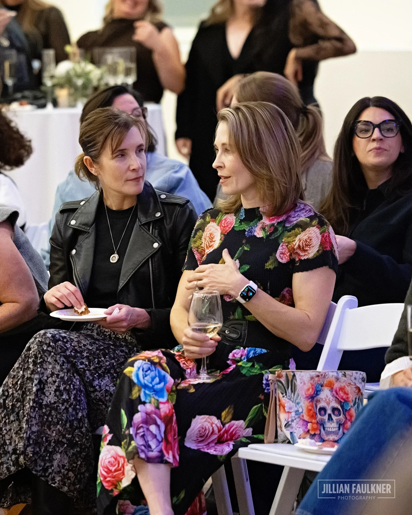 candid photos of event guests at runway show in Calgary