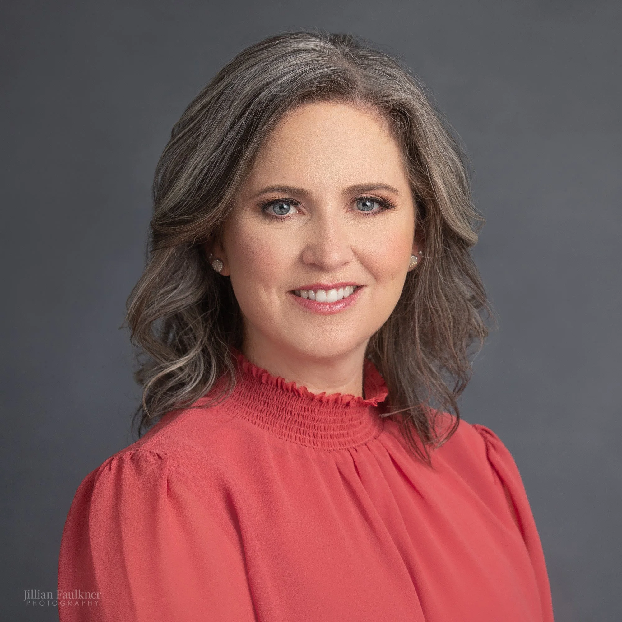 Smiling female professional tight crop headshot studio portrait SW Calgary
