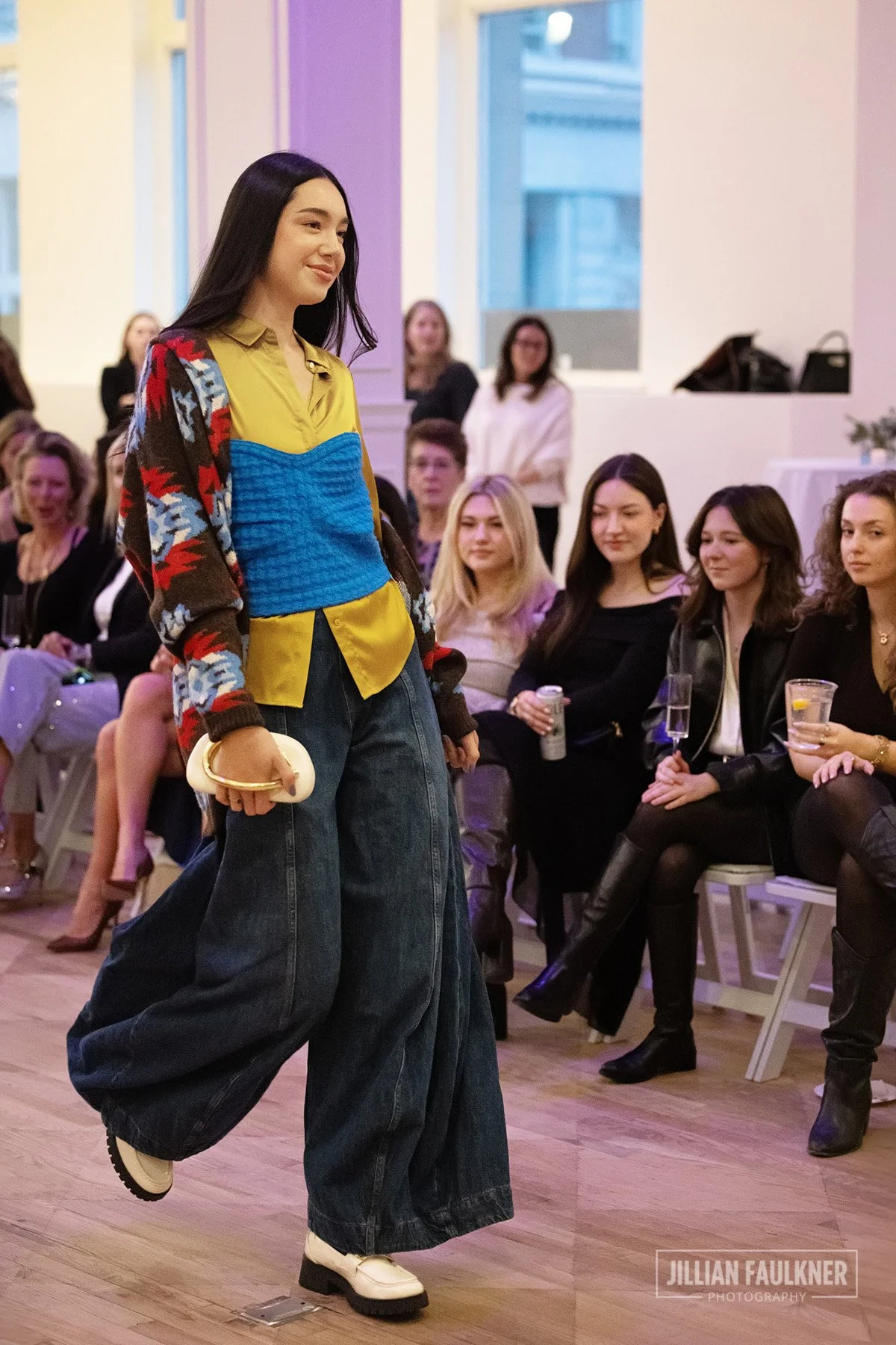 Calgary fashion event photographer captures dramatic runway lighting and elegantly styled models