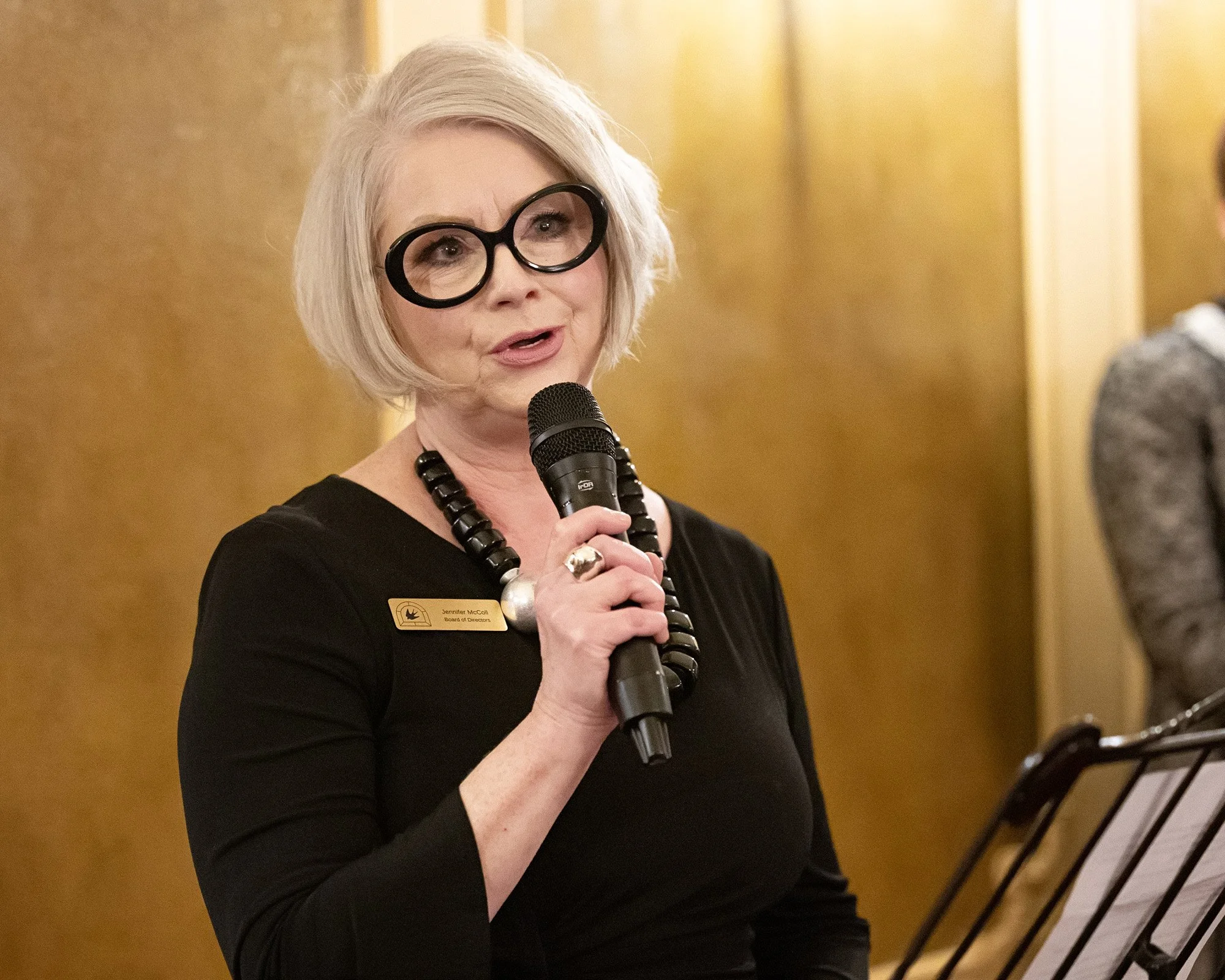 Calgary private event photographer captures milestone anniversary speech at Lougheed House gala