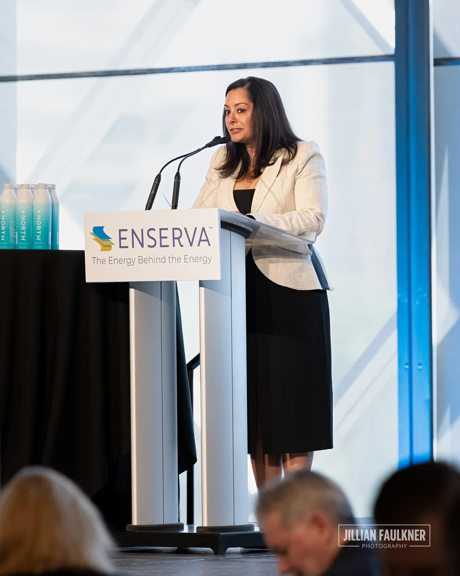 Calgary event photographer captures corporate team lead on stage