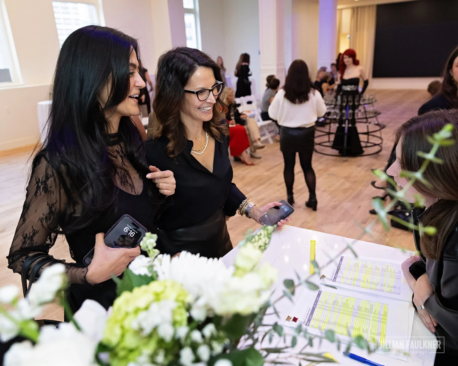 High quality Calgary event photography at the champagne welcome reception of Brookline PR's 20th Anniversary Fall Fashion Show