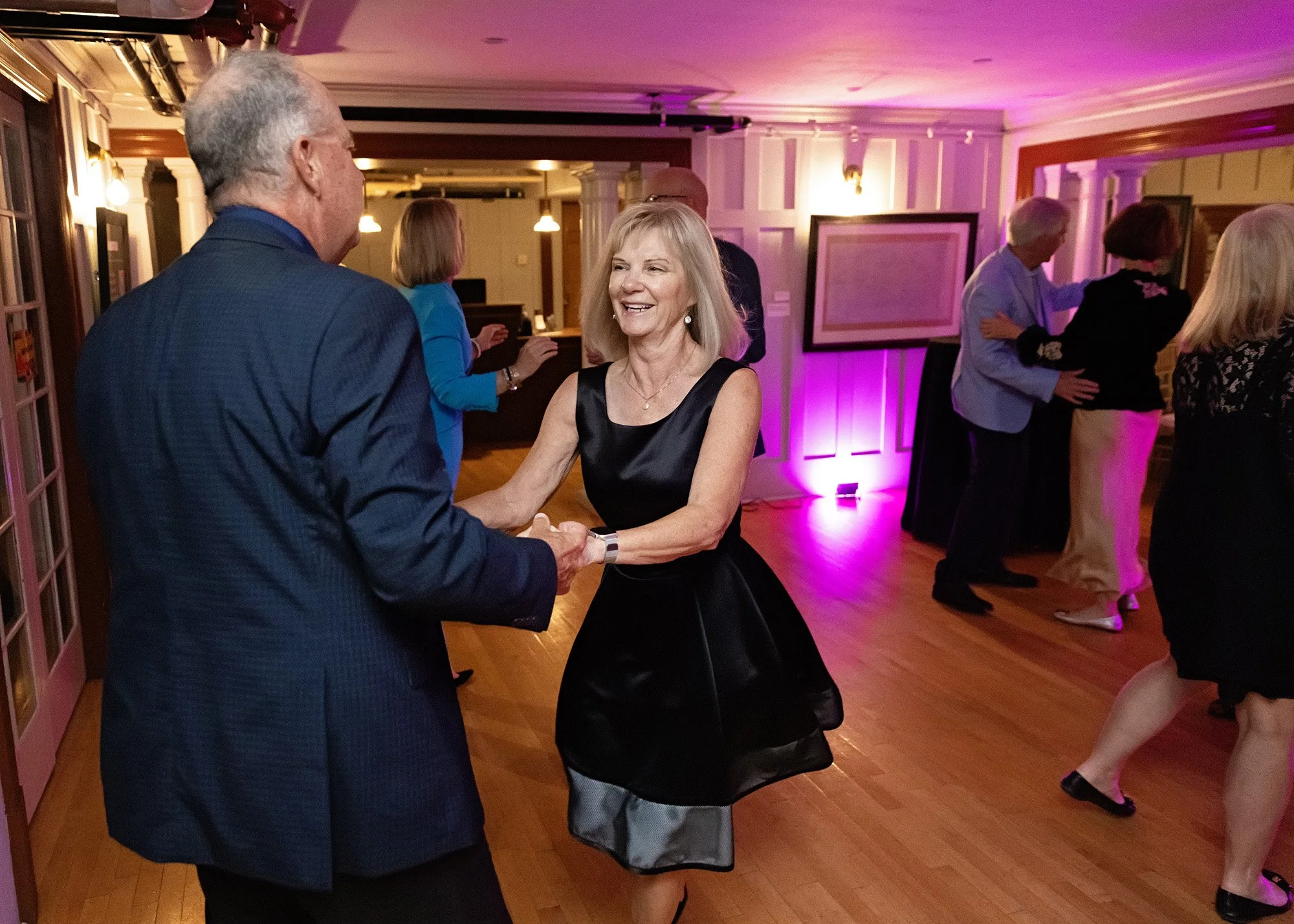 event photography of guests dancing on intimate dance floor in calgary