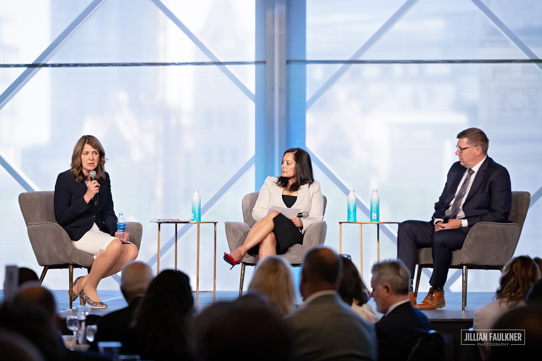 Experienced Calgary event photographer documents Premier Smith and Premier Moe on stage at Drive to Double luncheon