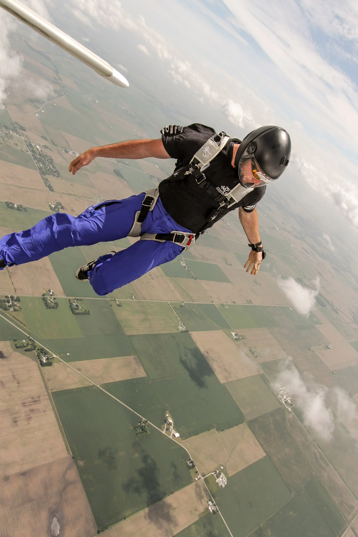 Skydiver steps out into the skies