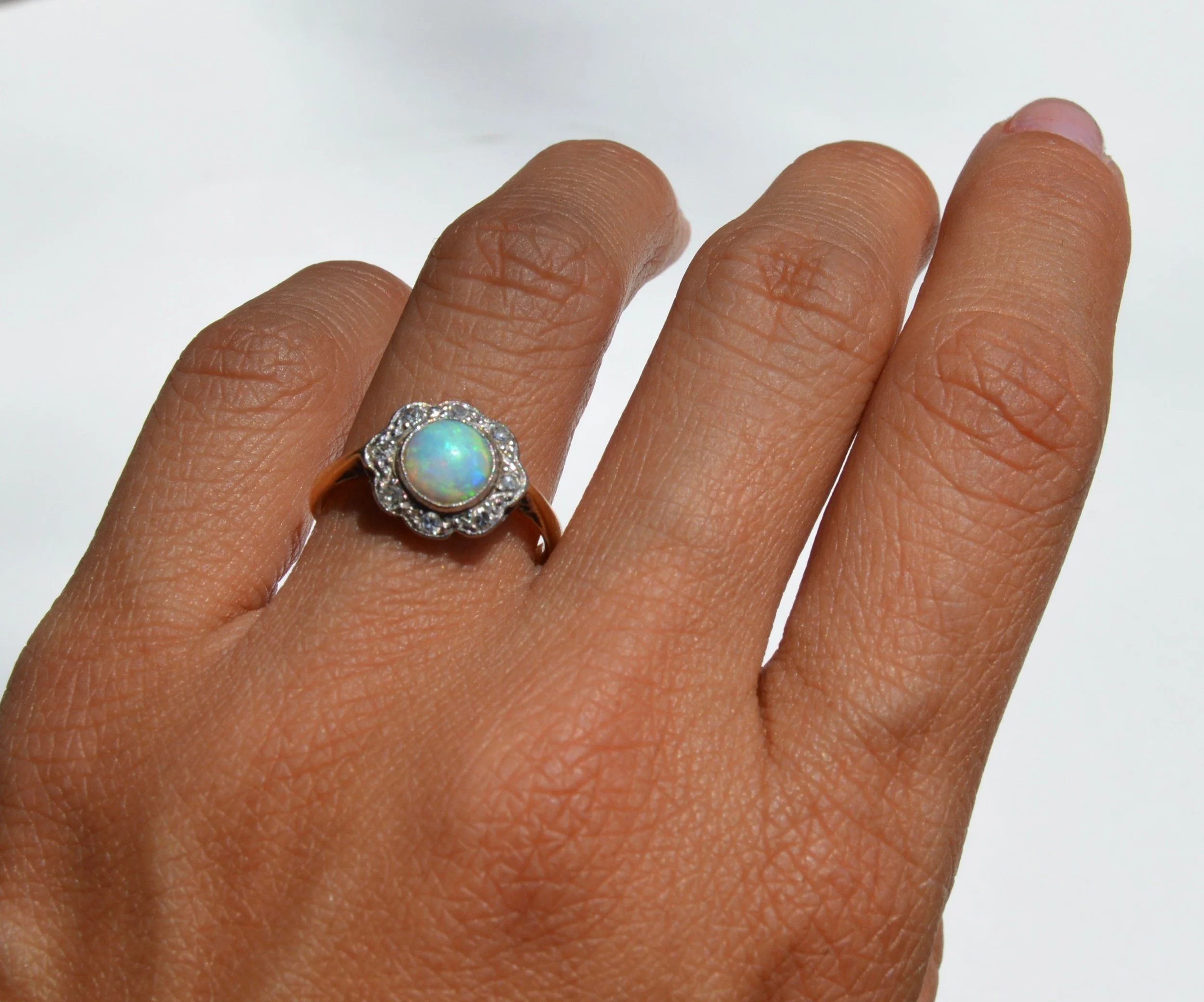 victorian opal diamond engagement halo ring hand