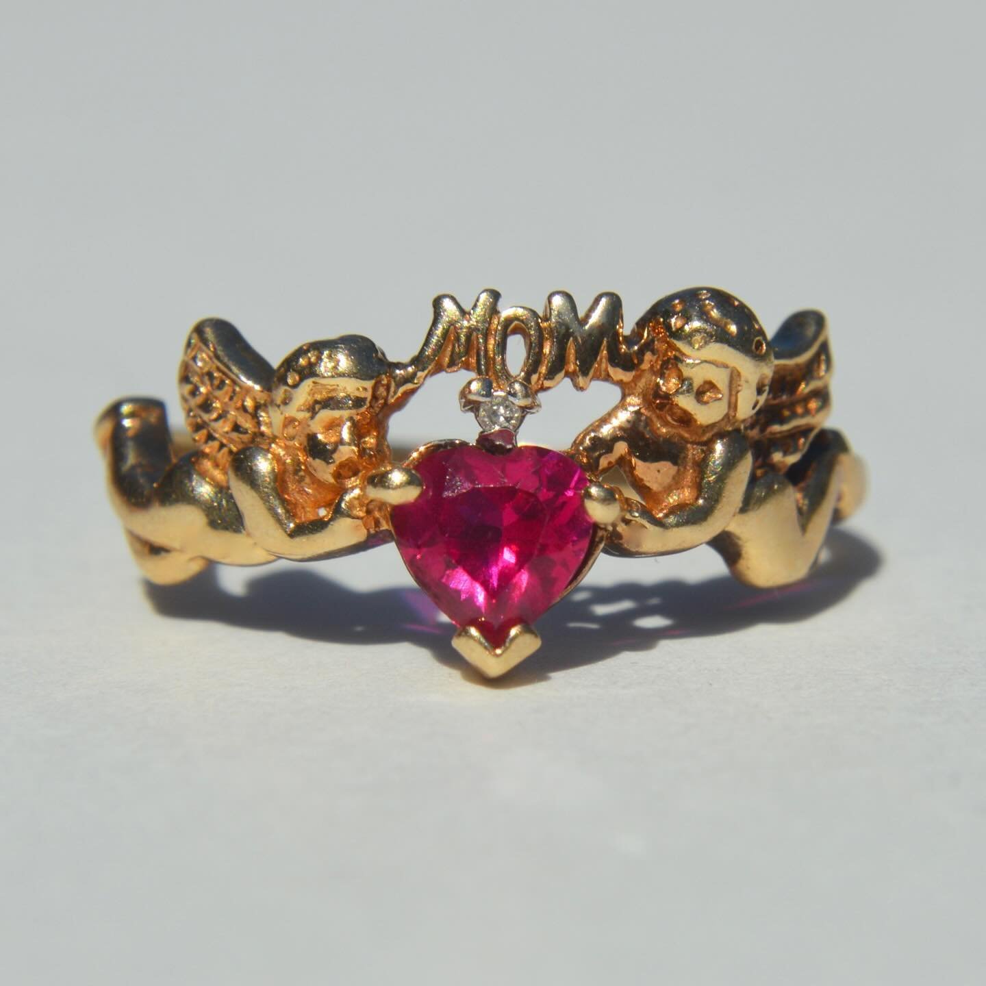 Mother&rsquo;s Day is May 12! Still looking for that perfect gift for a special MOM in your orbit?! Look no further than this completely adorbs vintage 10K diamond heart cut ruby with a pair of sweet cherubs 👼🩷👼 Online now, tap post to shop or lin