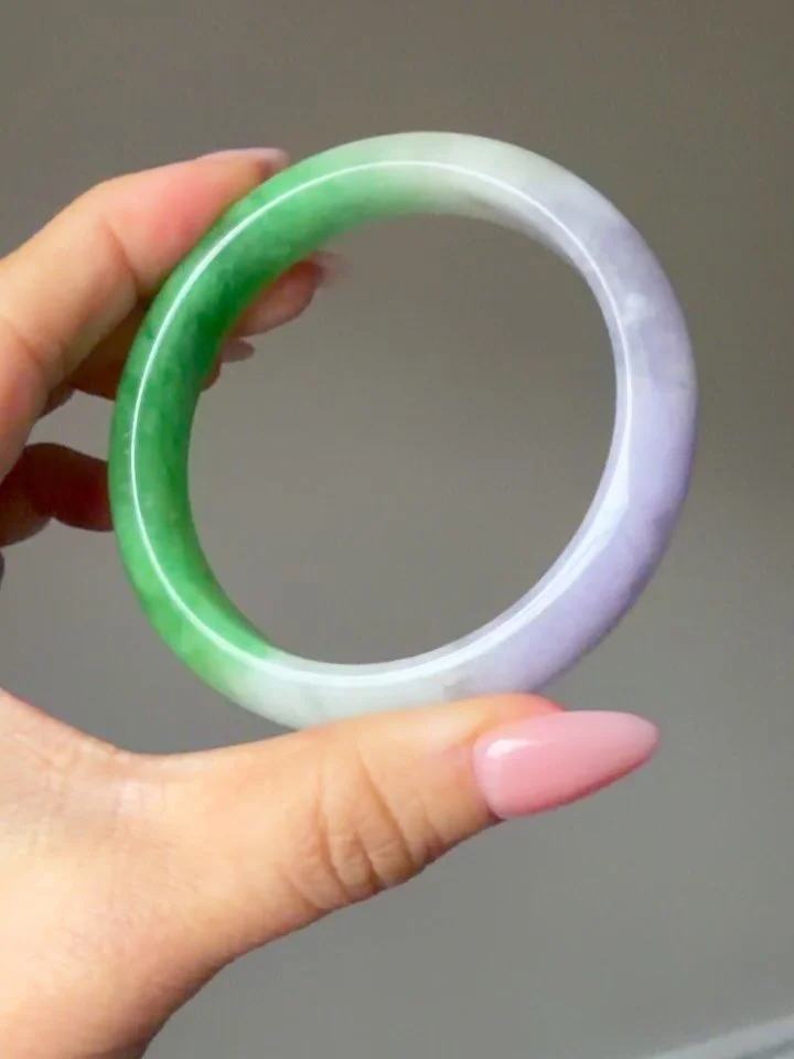 I found THE prettiest vintage natural lavender and green untreated jadeite jade 59mm bangle! It&rsquo;s kinda big on me, my wrist is about 5.5&rdquo; circumference. Would best fit more around a 7&rdquo; circumference wrist. DM to claim at 380 pre lis