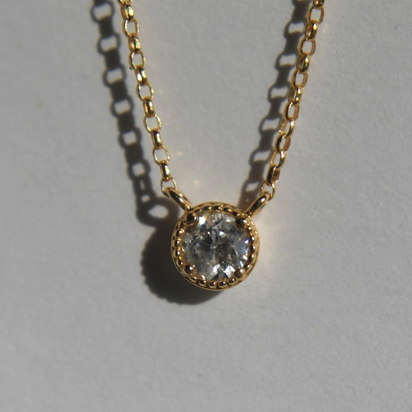 The prettiest and sparkliest 18K .25 carat brilliant cut natural near perfect diamond solitaire necklace on an oval rolo chain 💎 Online now, link in bio or tap to shop