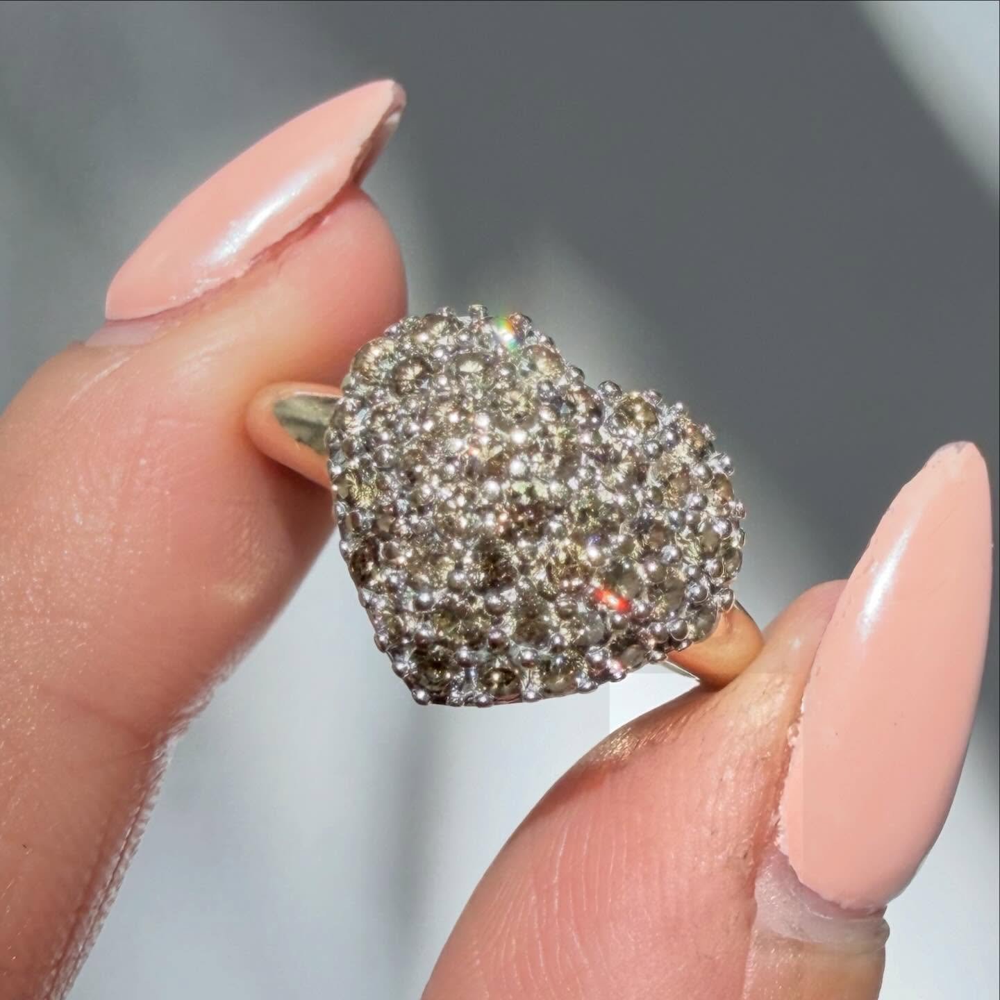 Ira almost Mother&rsquo;s Day! Enter MOM10 at checkout for 10% off sitewide 🌷Getting blinded by the sparkle from this glittering vintage 14K champagne diamond pav&eacute; heart! Online now, link in bio or tap to shop 😍💎 #vintagediamondring