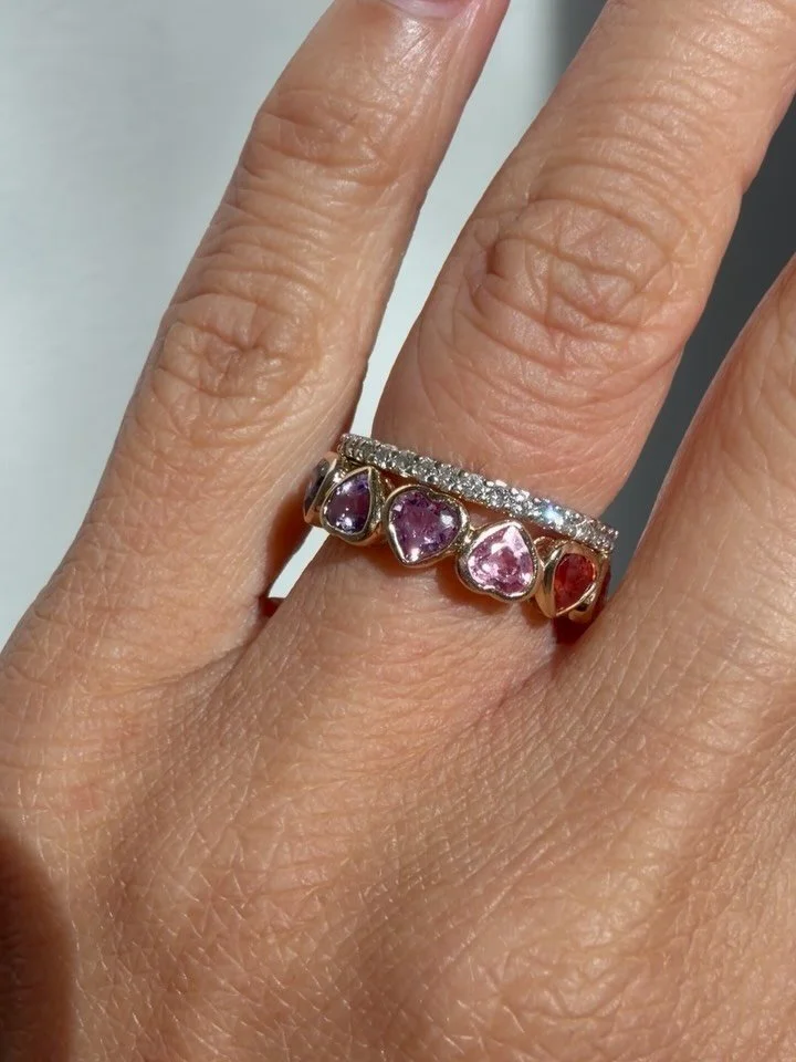 These gorgeous vintage 18K eternity bands are available! 18K white gold diamond size 4.25 (excellent condition) 590 shipped, and 18K yellow gold rainbow sapphire heart cut size 4.5 (has a little wear on the stones, reflected in pricing) 850 shipped ?