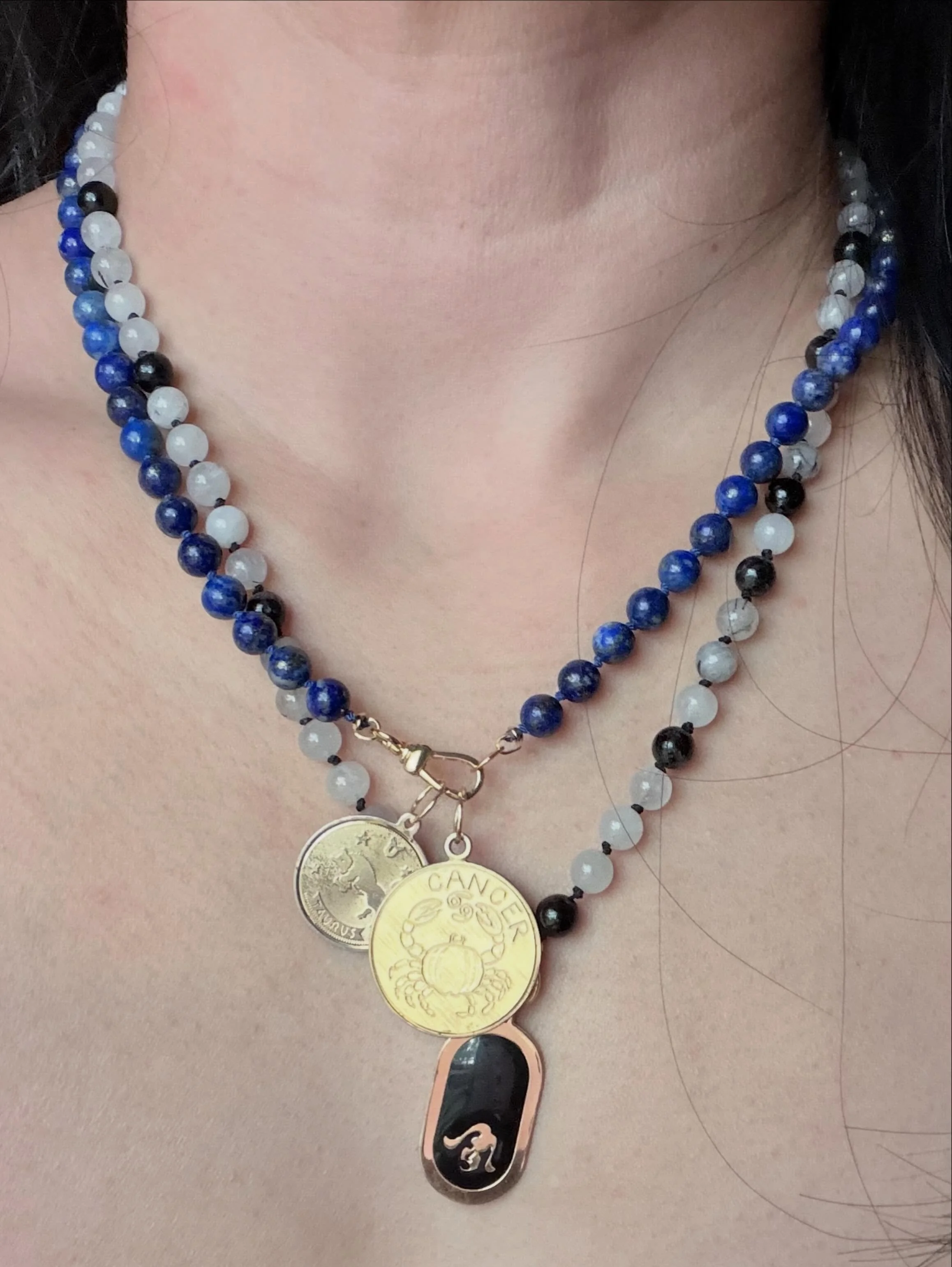 Vintage gold fill zodiacs and rutilated quartz black tourmaline, lapis lazuli 6mm silk cord knotted strands with 18K gold fill swivel dog clips. DM for info! #virgo #zodiaccharms #astrology #taurus #cancer