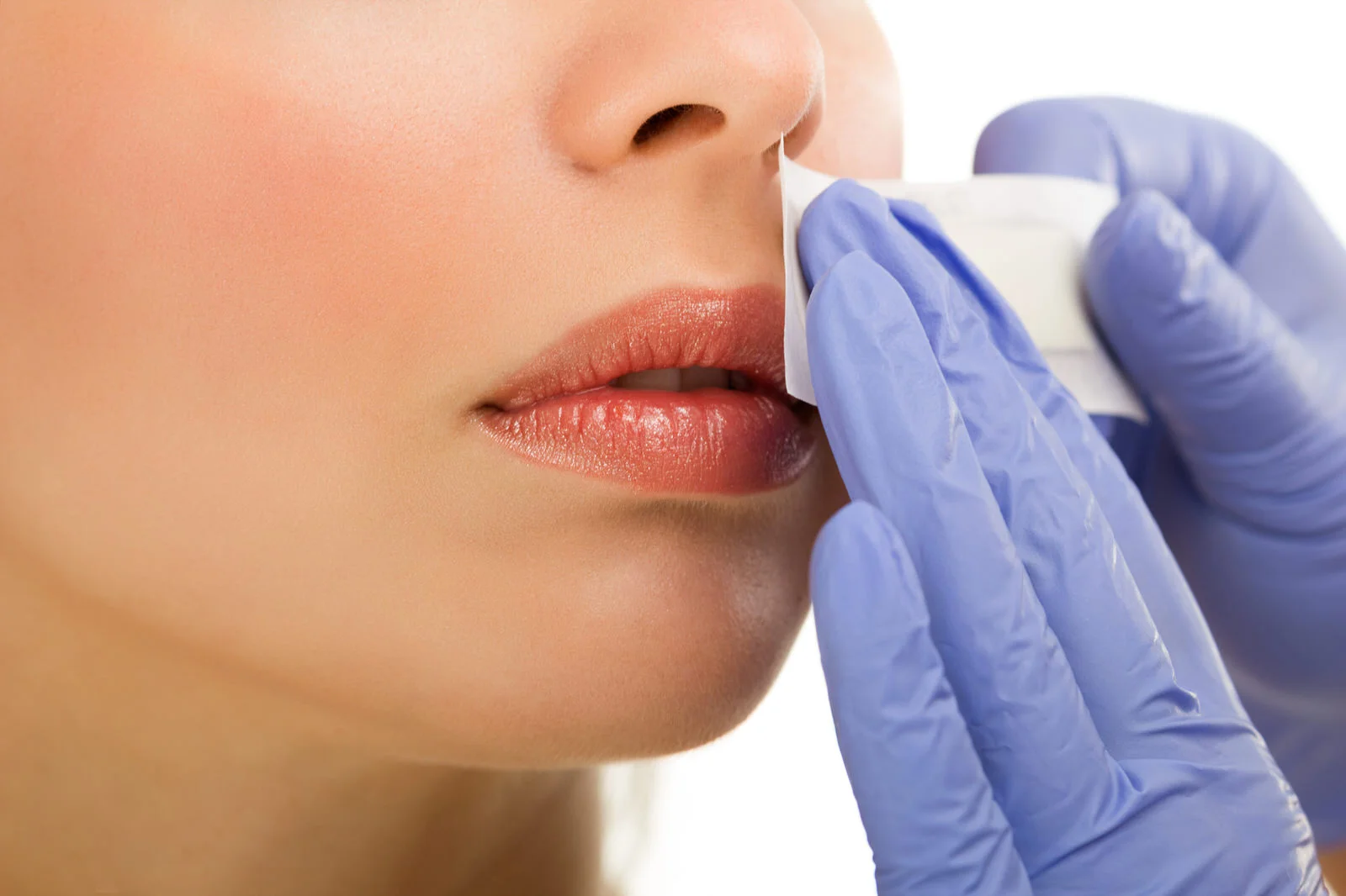 A woman receiving a professional facial
