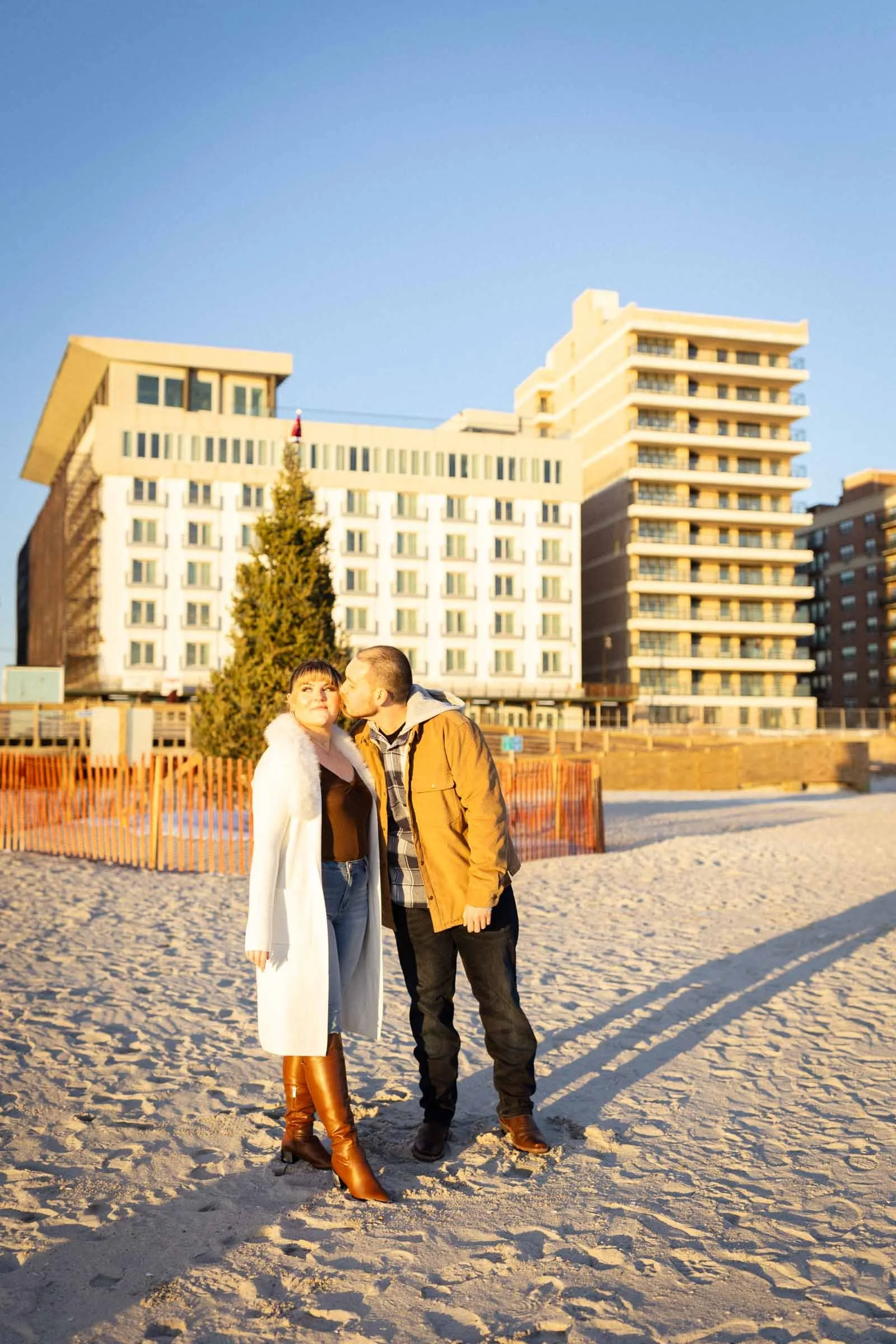  Couple kissing in front of Allegria Hotel in Long Beach, NY.  