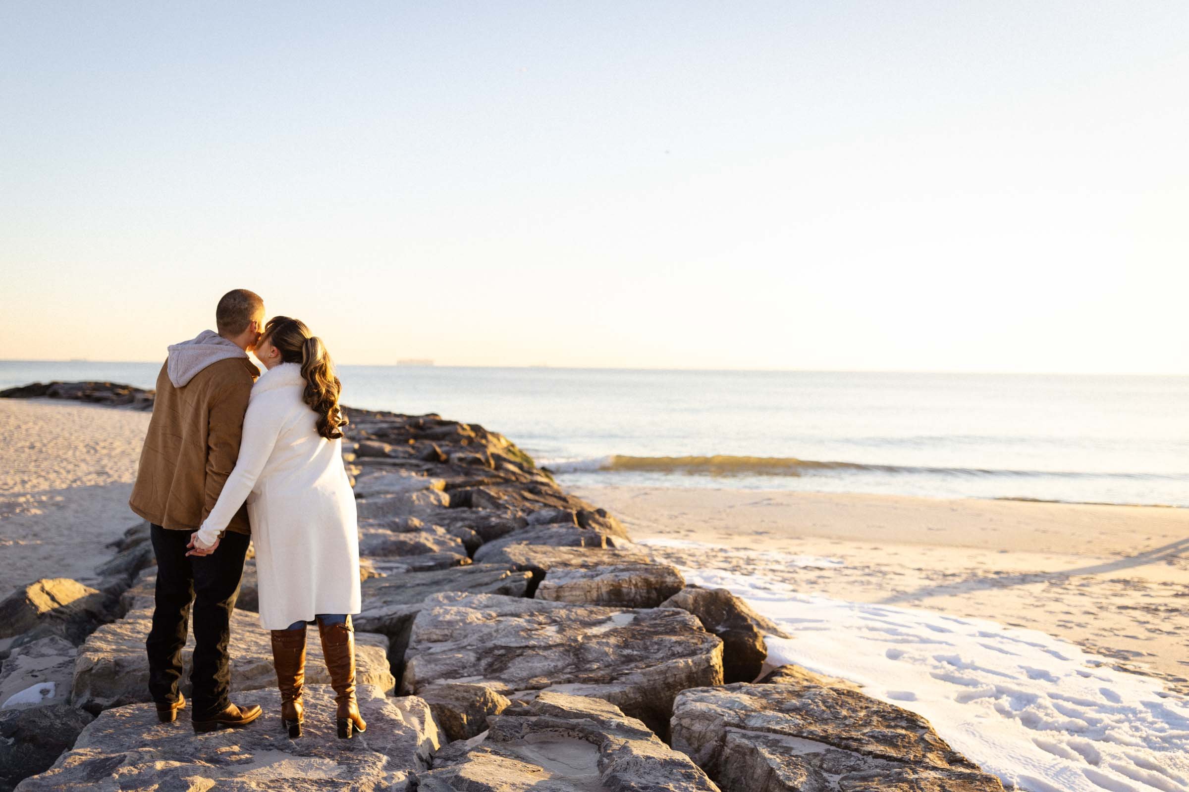  Couple kissing on breaker at Long Beach, NY 