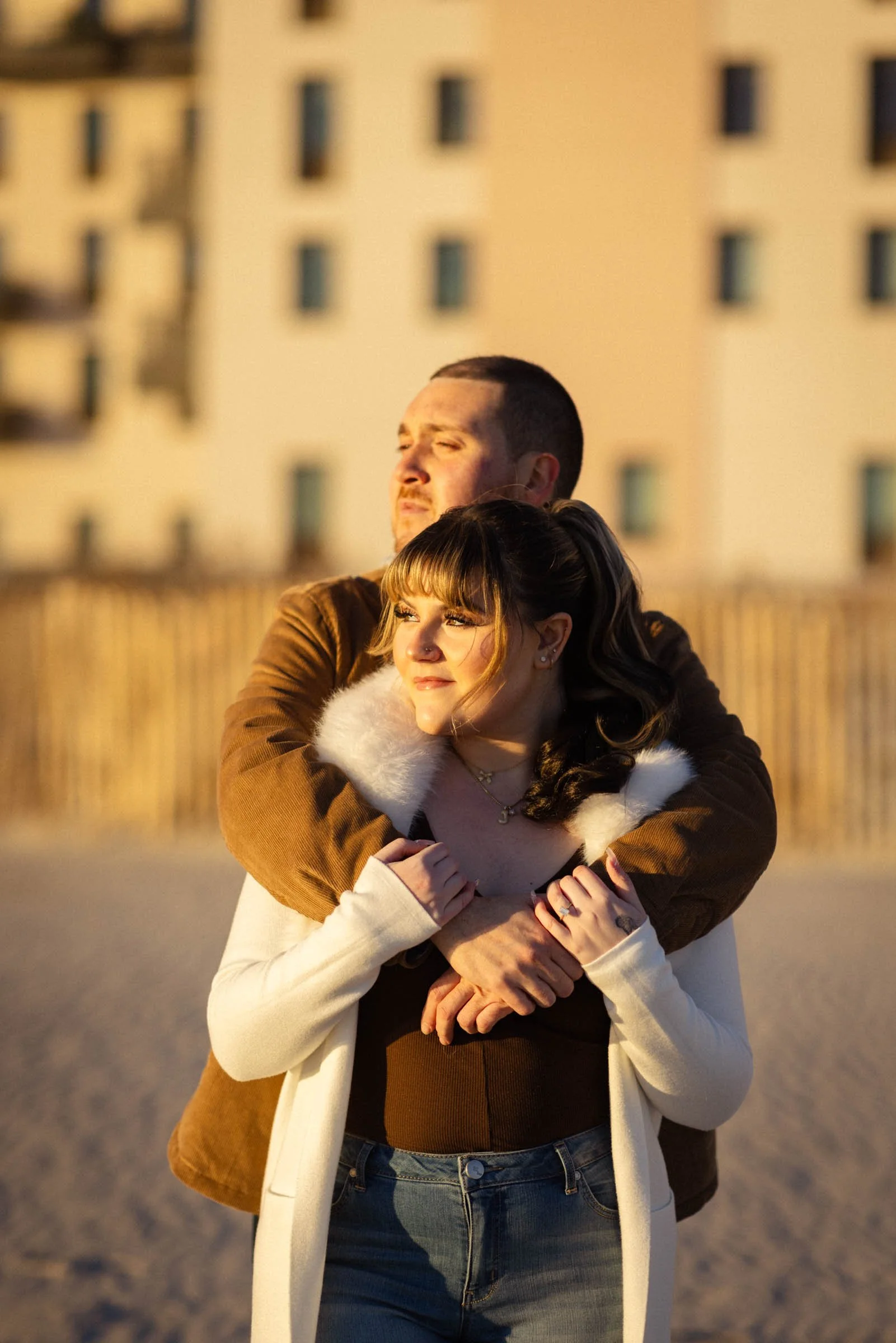  Couple embracing in sunlight 