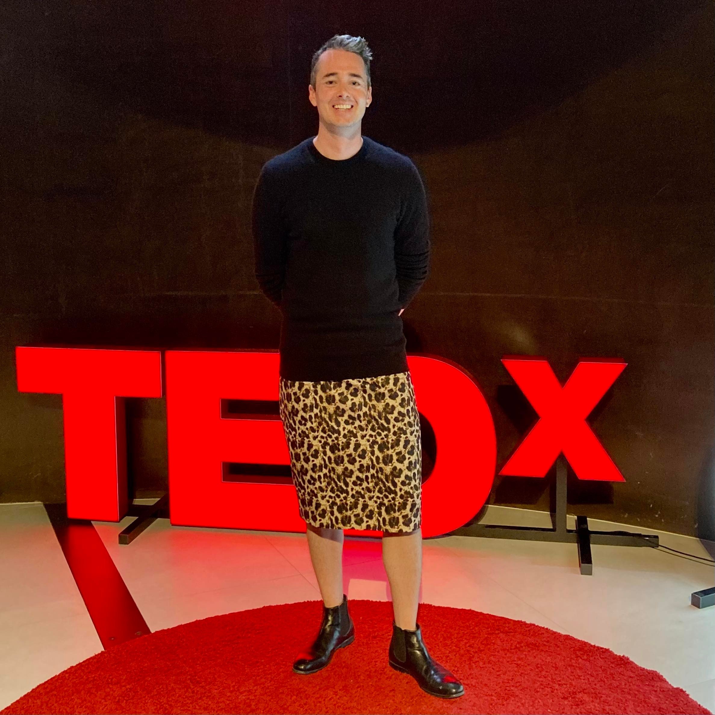 Dylan with TEDx sign.jpg