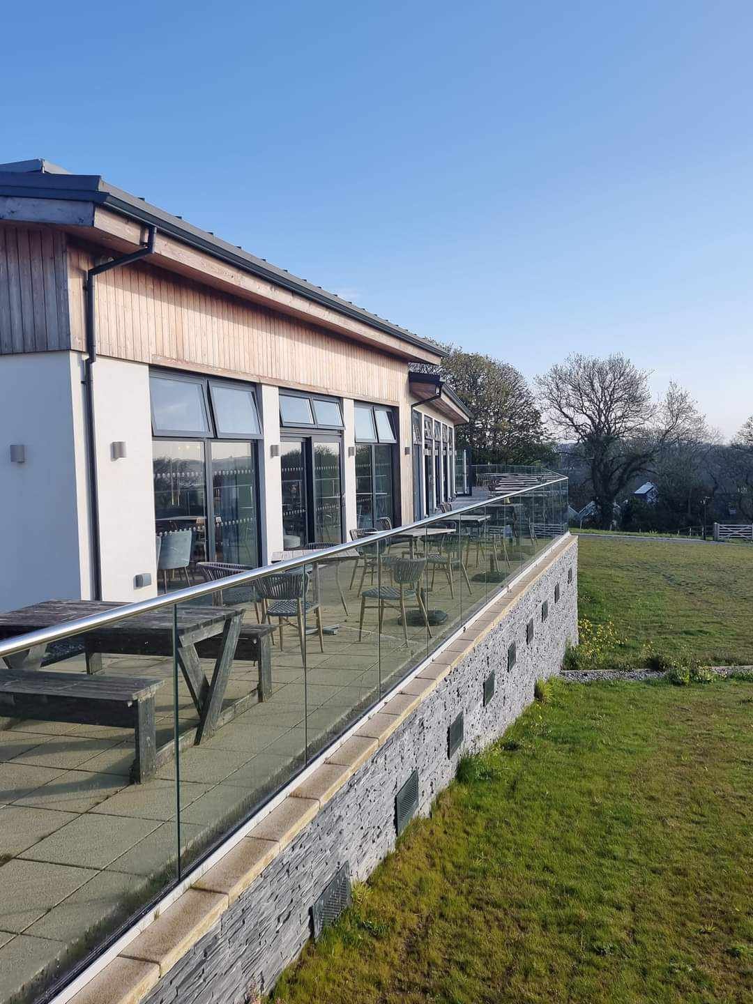 Modern building with new seamless aluminium guttering supplied and installed by South West Guttering Services.