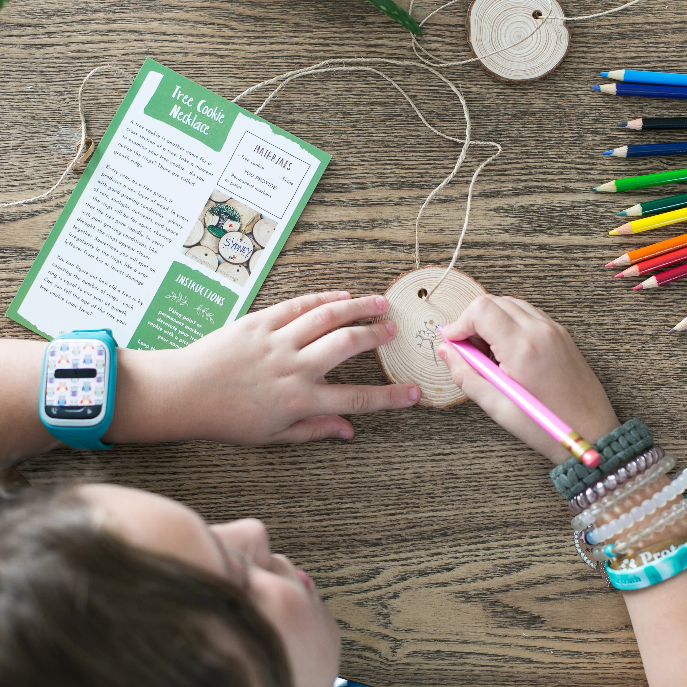 DIY tree cookie necklace activity, featured in the Wonderkin Tree Box