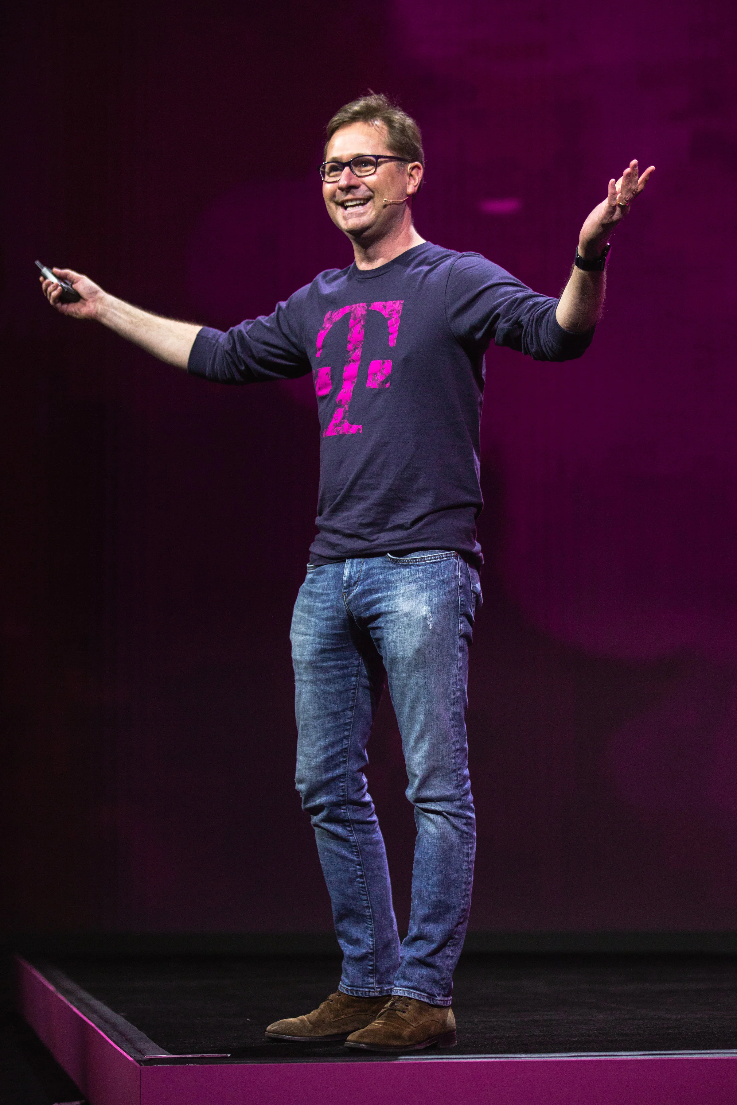 Mike Sievert, T-Mobile's President &amp; CEO, wearing one of my t-shirt designs at one of their many presentations.