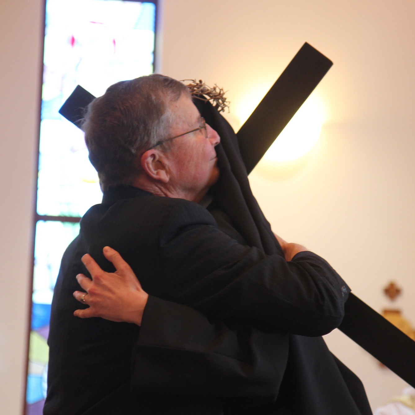  A father’s embrace - Sr. Cecilia Maria and her dad, Tim, exchange a sign of peace. 