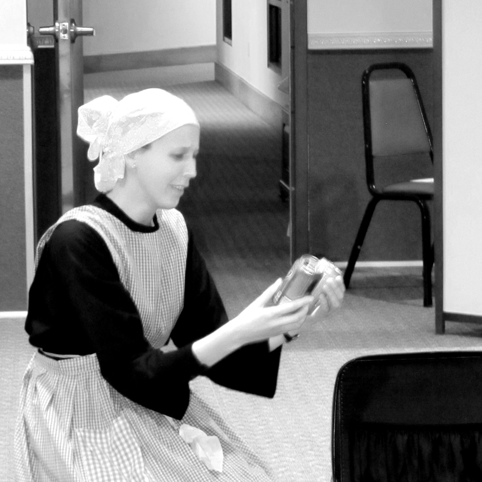  Isabel as Pacifica, the Possenti family’s maid, packing Gabriel’s things for his entrance to the Passionists. 