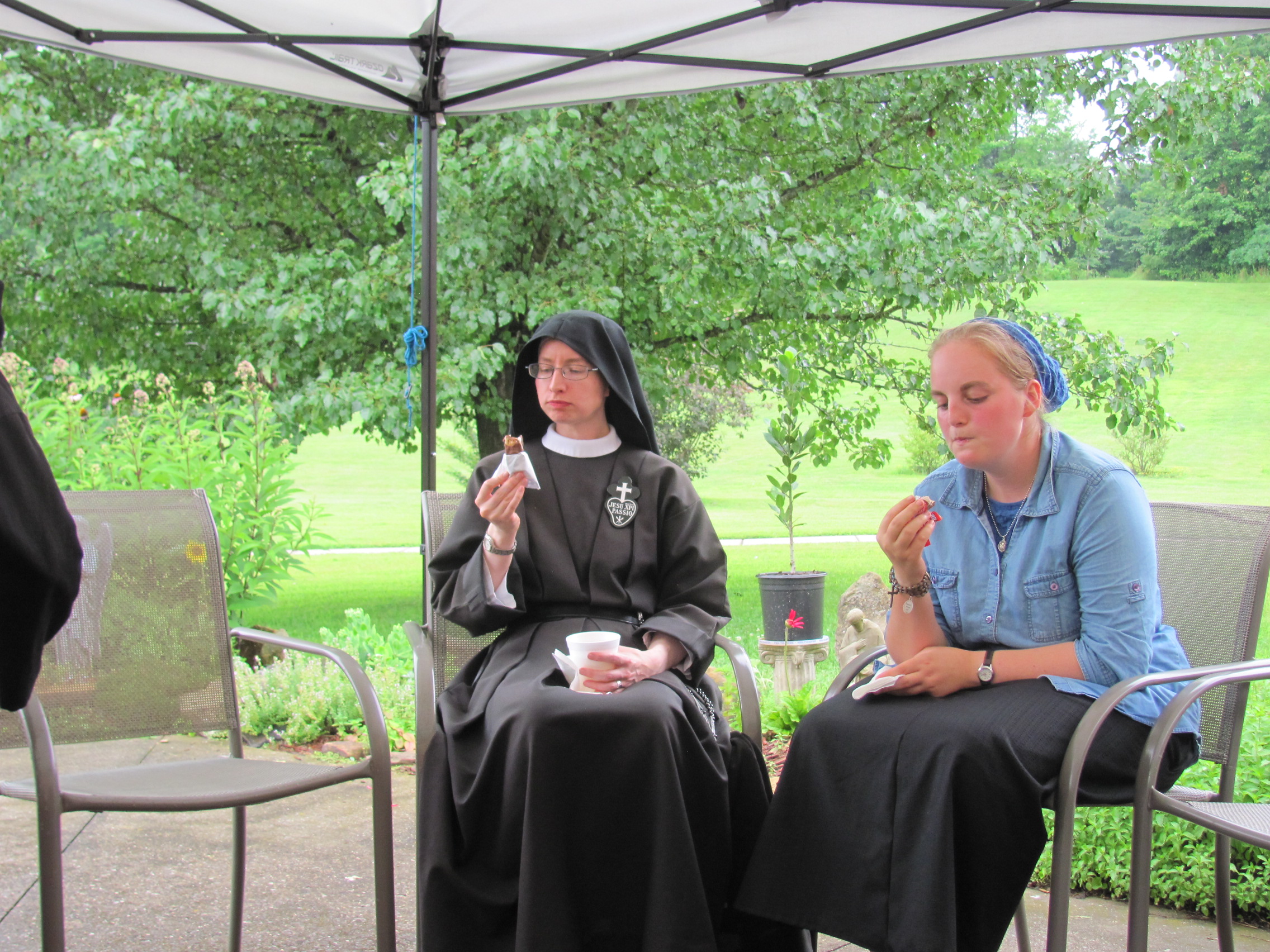  Sr. Cecilia Maria and Abbey deep in ice cream contemplation. 