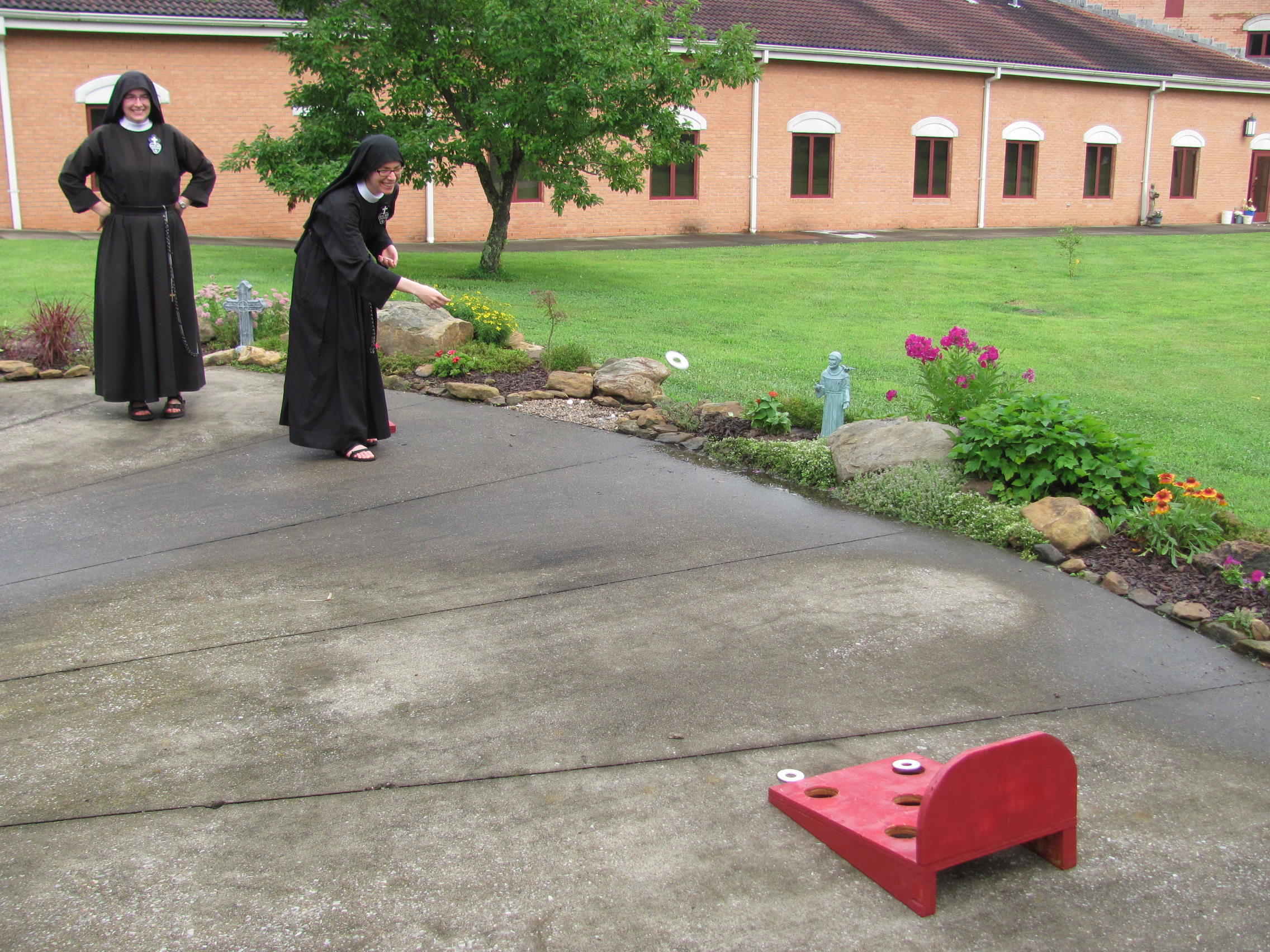  A rousing game of washers ensued.  Here’s Sr. Maria Faustina showing off her throws. 