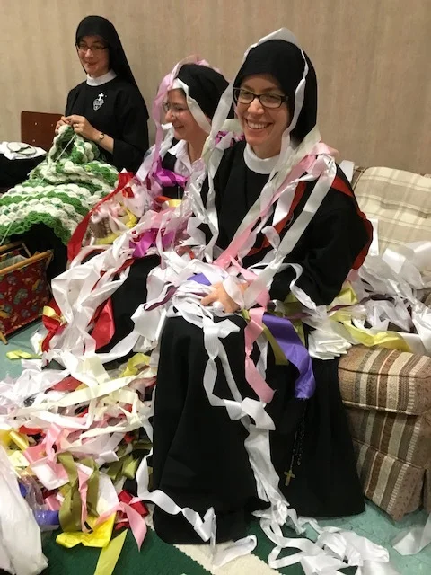 Theresa and Sr. Maria Faustina shared in the celebratory ribbon dispersal.