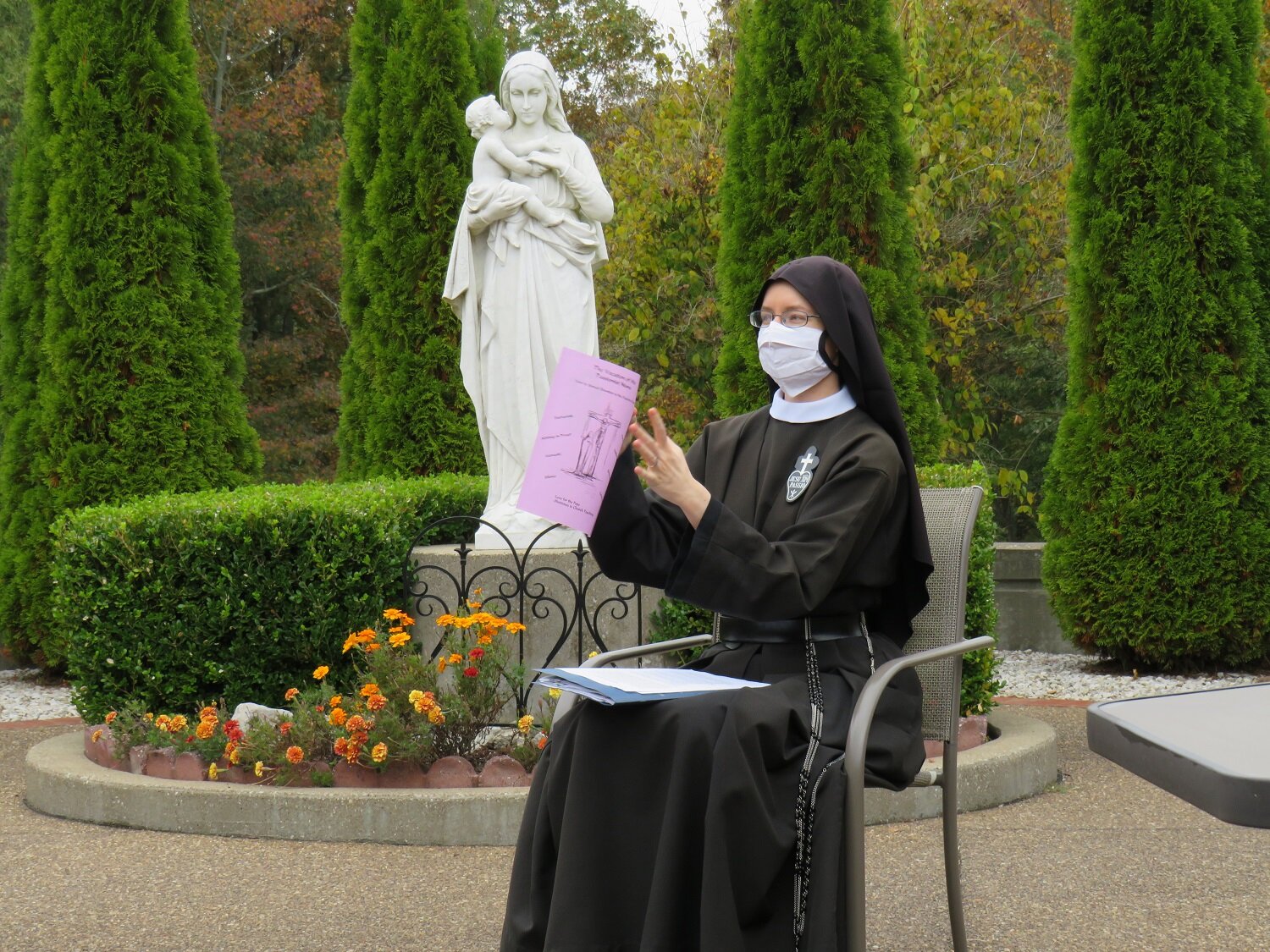  Sister Cecilia Maria preparing for a talk on the retreat house plaza 