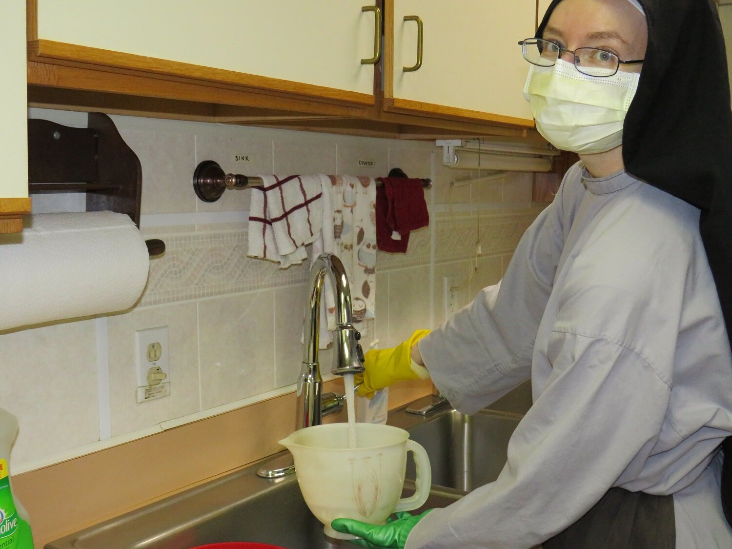  Sister Cecilia Maria mixing up a new batch of peroxide cleaning solution 