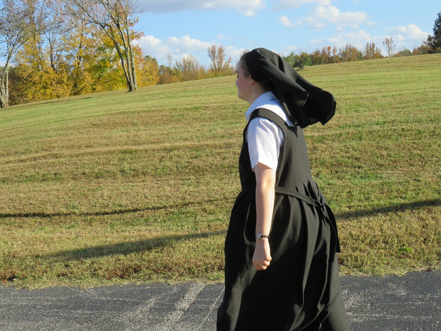  The autumn wind easily catches Postulant Abbey’s veil when she’s out on a walk! 