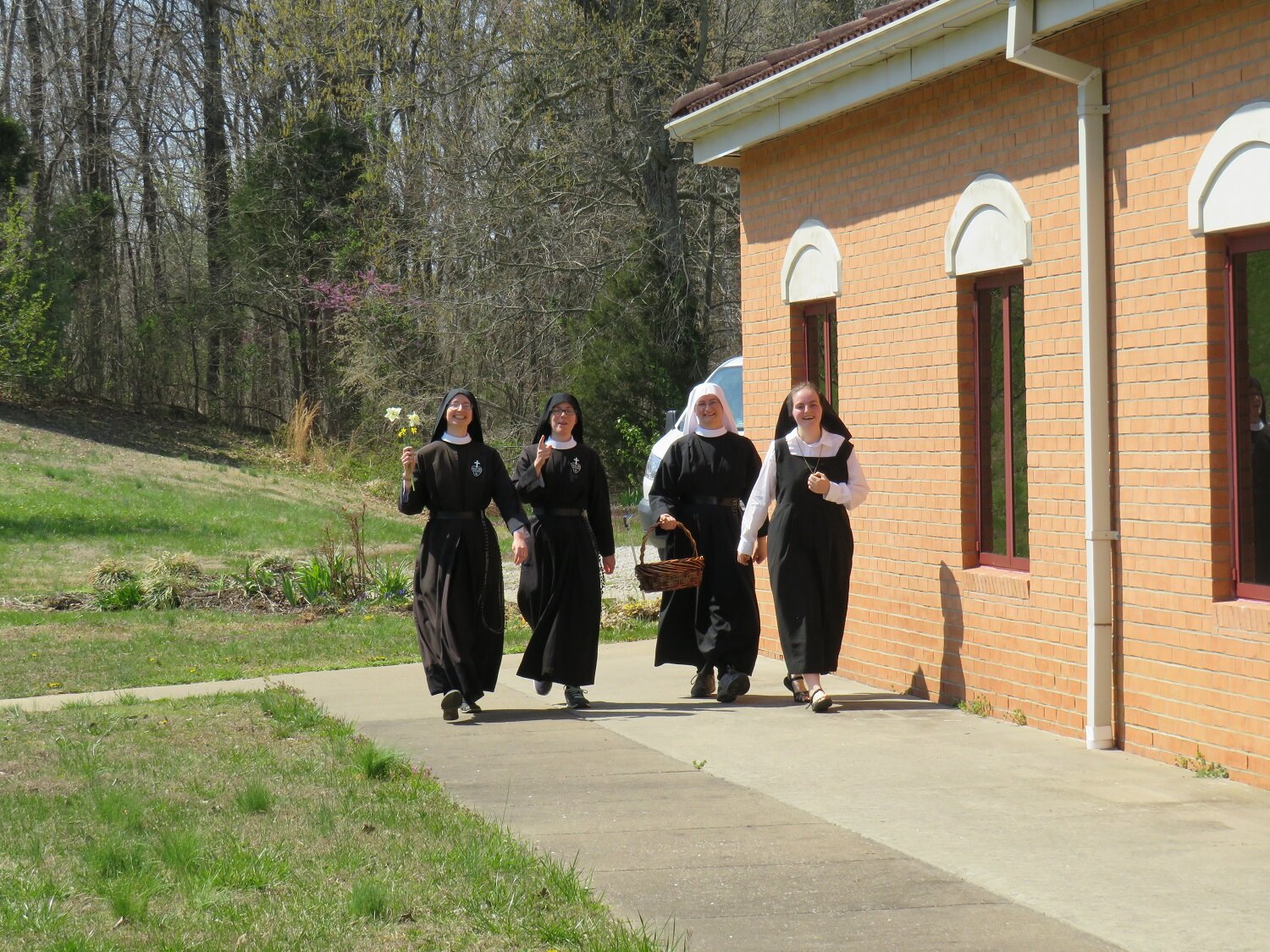  Team Other Mary, rescued by Postulant Abbey, rounds the finish line — alleluia! 