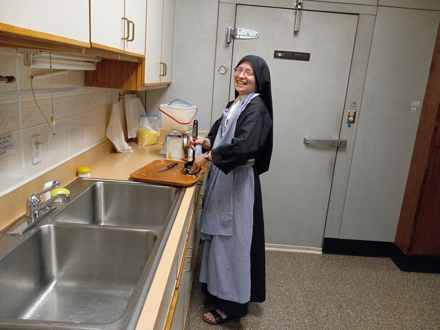  Sr. Frances Marie was in charge of dividing the corn into 4-pound bags for freezing — and she got a little “creative” in trying to keep her habit clean … 