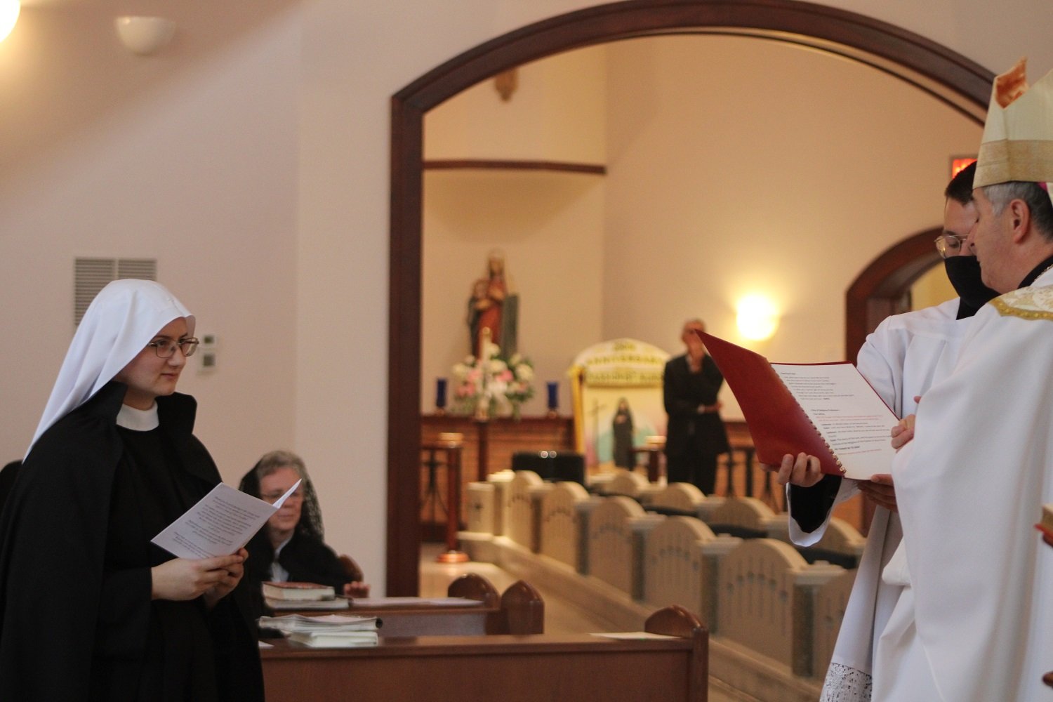  The rite of calling: before the homily, Bishop Medley calls by name the Sister to be professed. She expresses her desire to make Passionist vows in a spirit of humble obedience to God’s Will. 