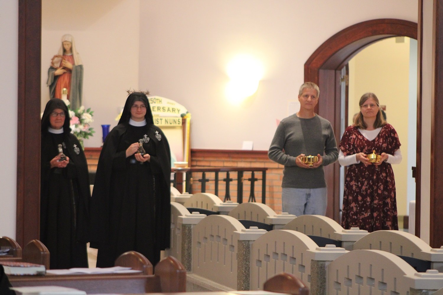  Offertory procession with the newly-professed, her parents, and her Novice Directress, Sr. Mary Veronica 